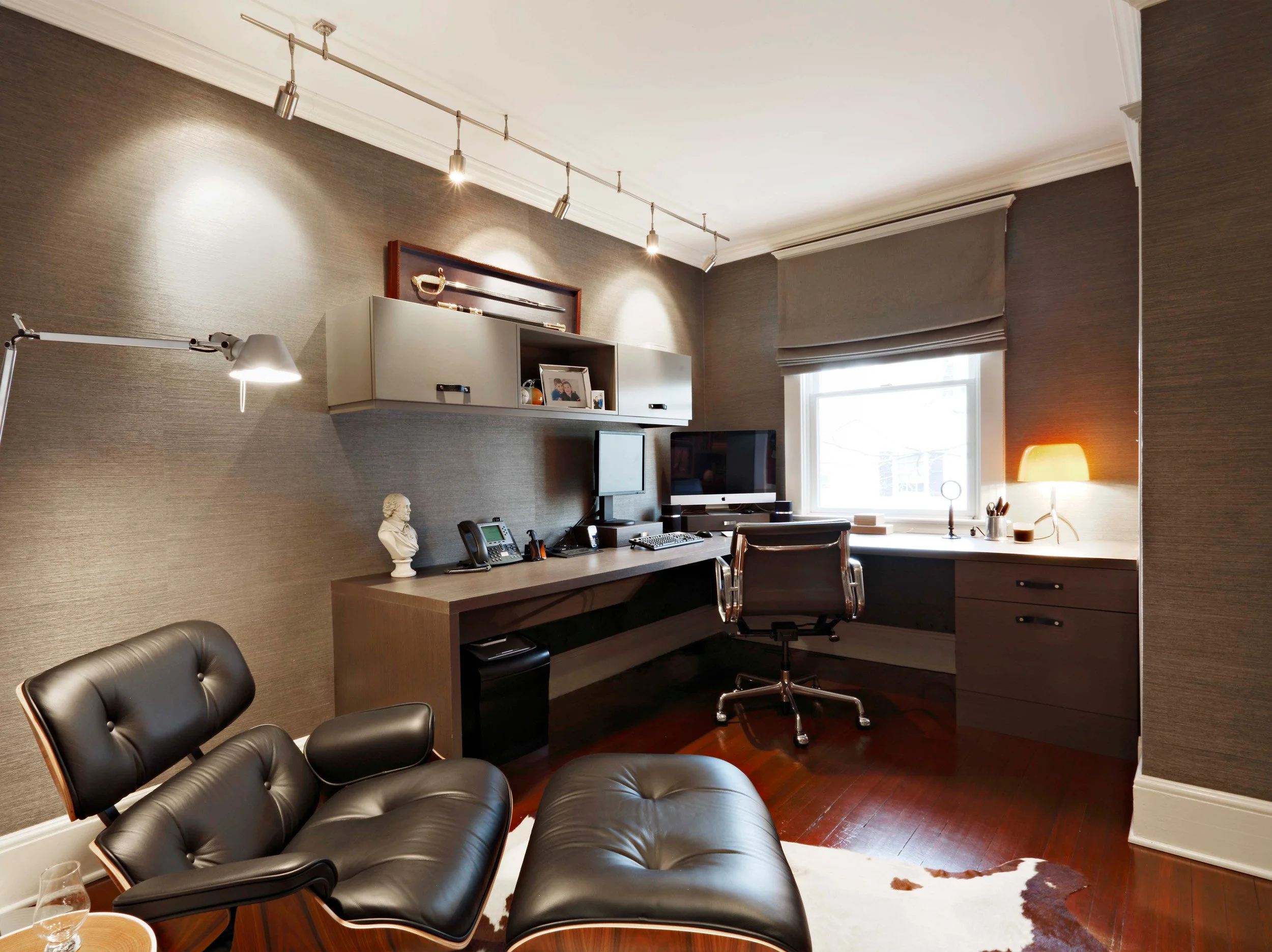 Home office in Indian Field residence in Greenwich, CT designed by Luminosus Designs with custom millwork and seating.