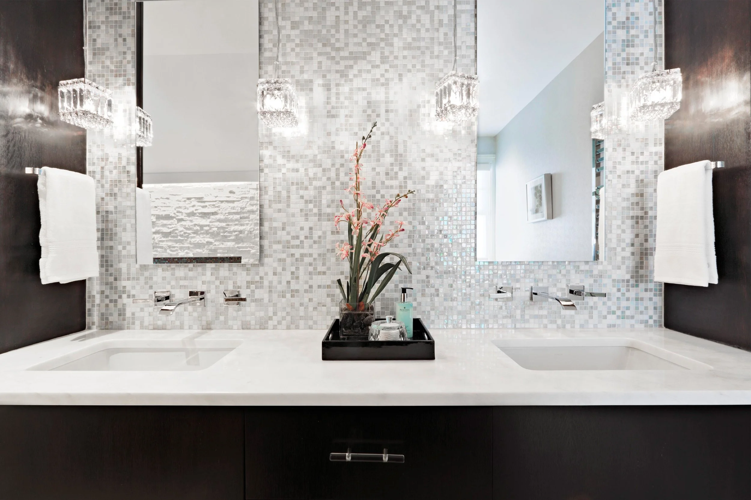 close-up view of the custom vanity and backsplash tile in a primary bathroom in Old Briarcliff, NY.