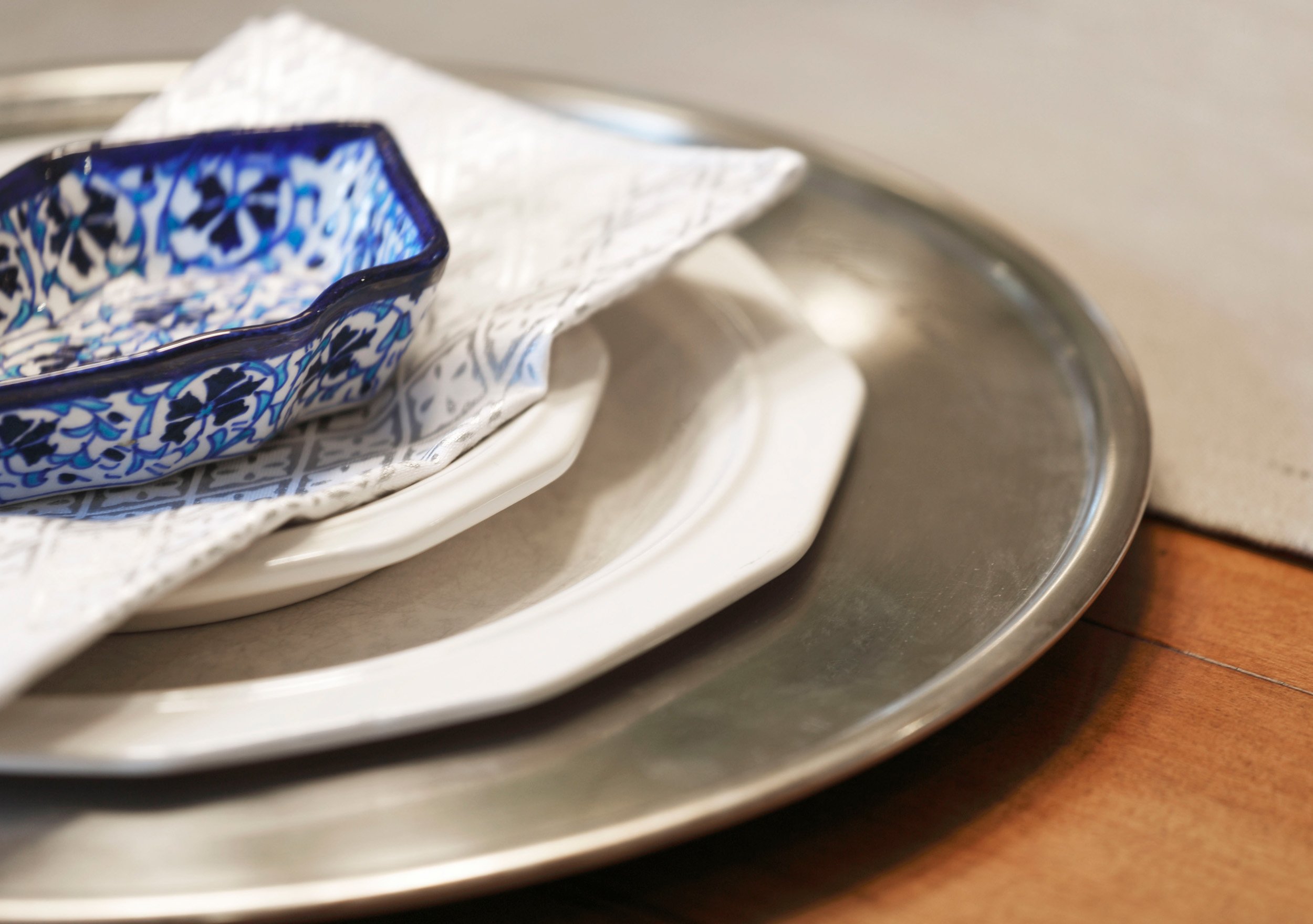 Detail of china display integrated into dining room storage in Indian Field residence in Greenwich, CT.