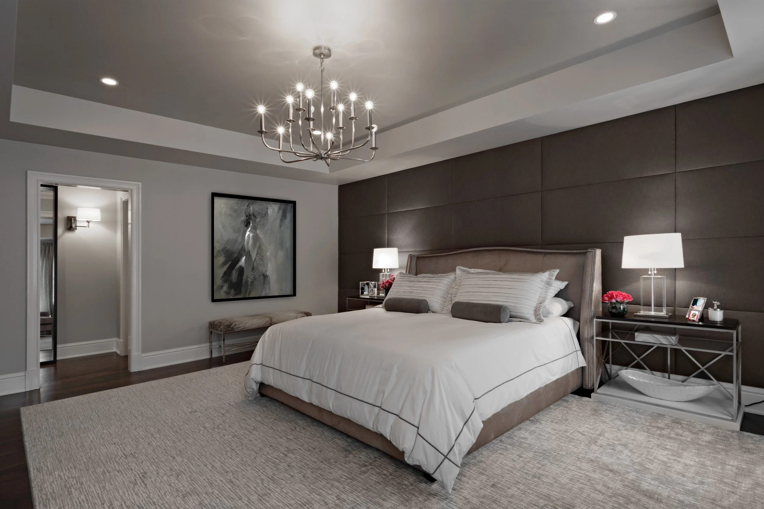 Primary bedroom in Parkfield House in Scarsdale NY home with upholstered wall and silver leaf ceiling treatment by Luminosus Designs.