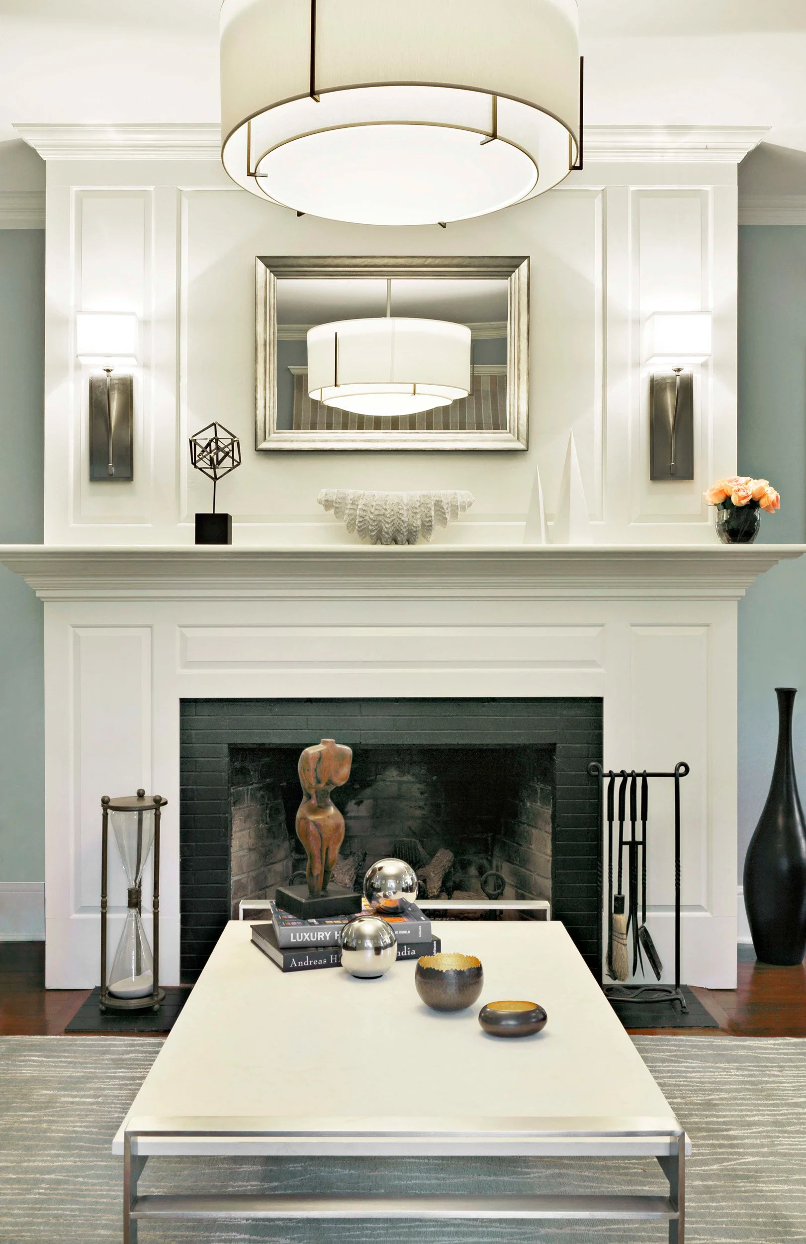 Close-up of fireplace surround and millwork detail in Indian Field residence in Greenwich, CT.