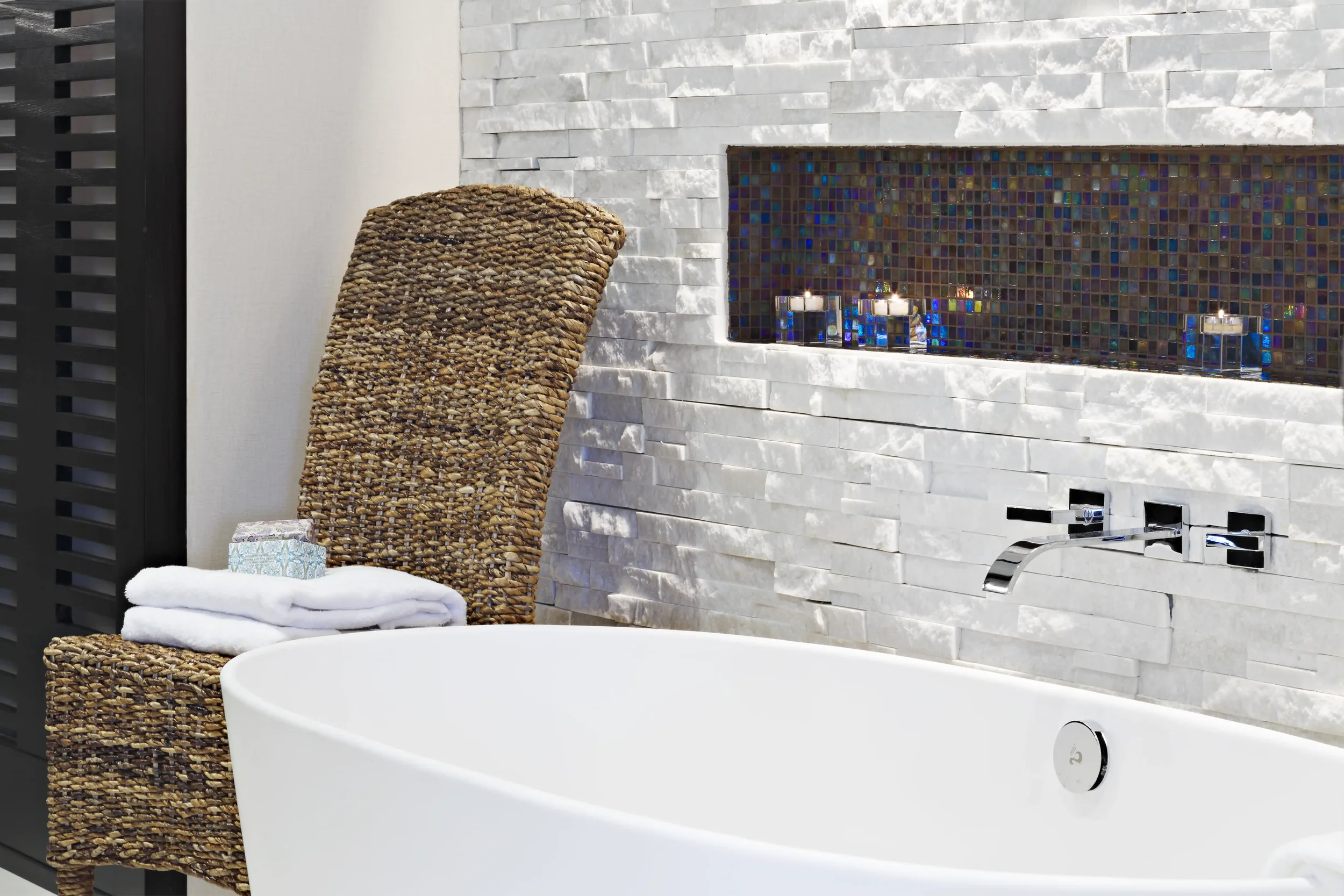close-up view of the serene soaking tub with wall mount tub filler in a primary bathroom in Old Briarcliff residence, Briarcliff Manor, , NY.