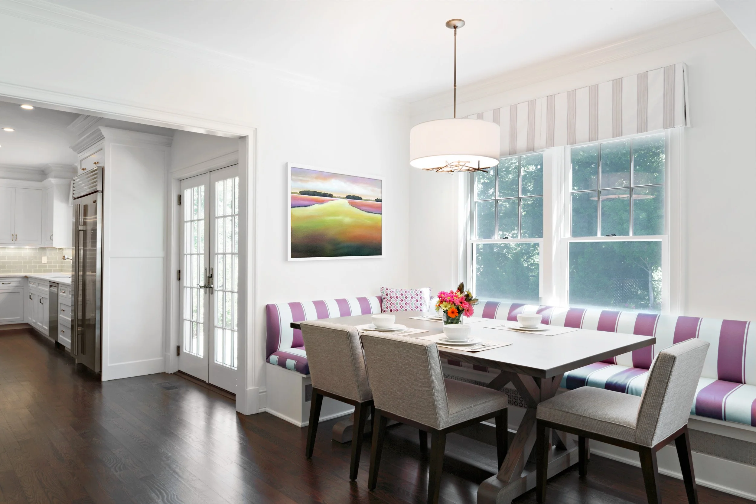 Elegant built-in breakfast banquette with custom upholstery by Luminosus Designs for Parkfield House, Scarsdale NY.