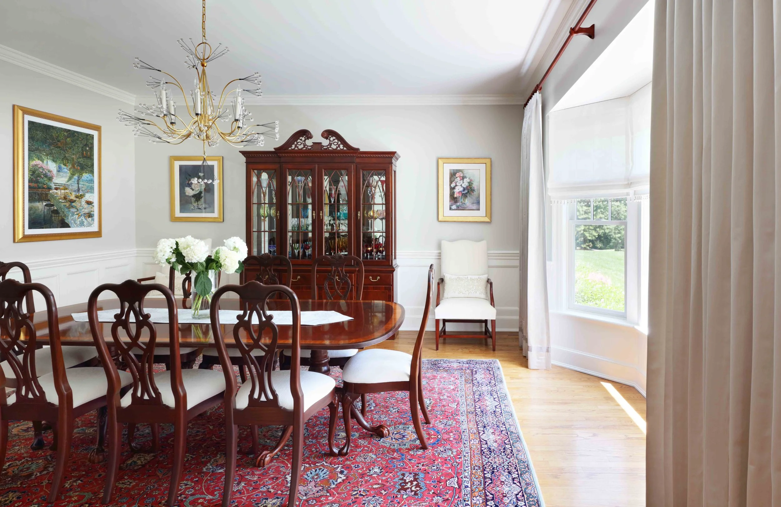 Dining Room featuring china cabinet, dining set at Lismore House in Greenwich, CT.