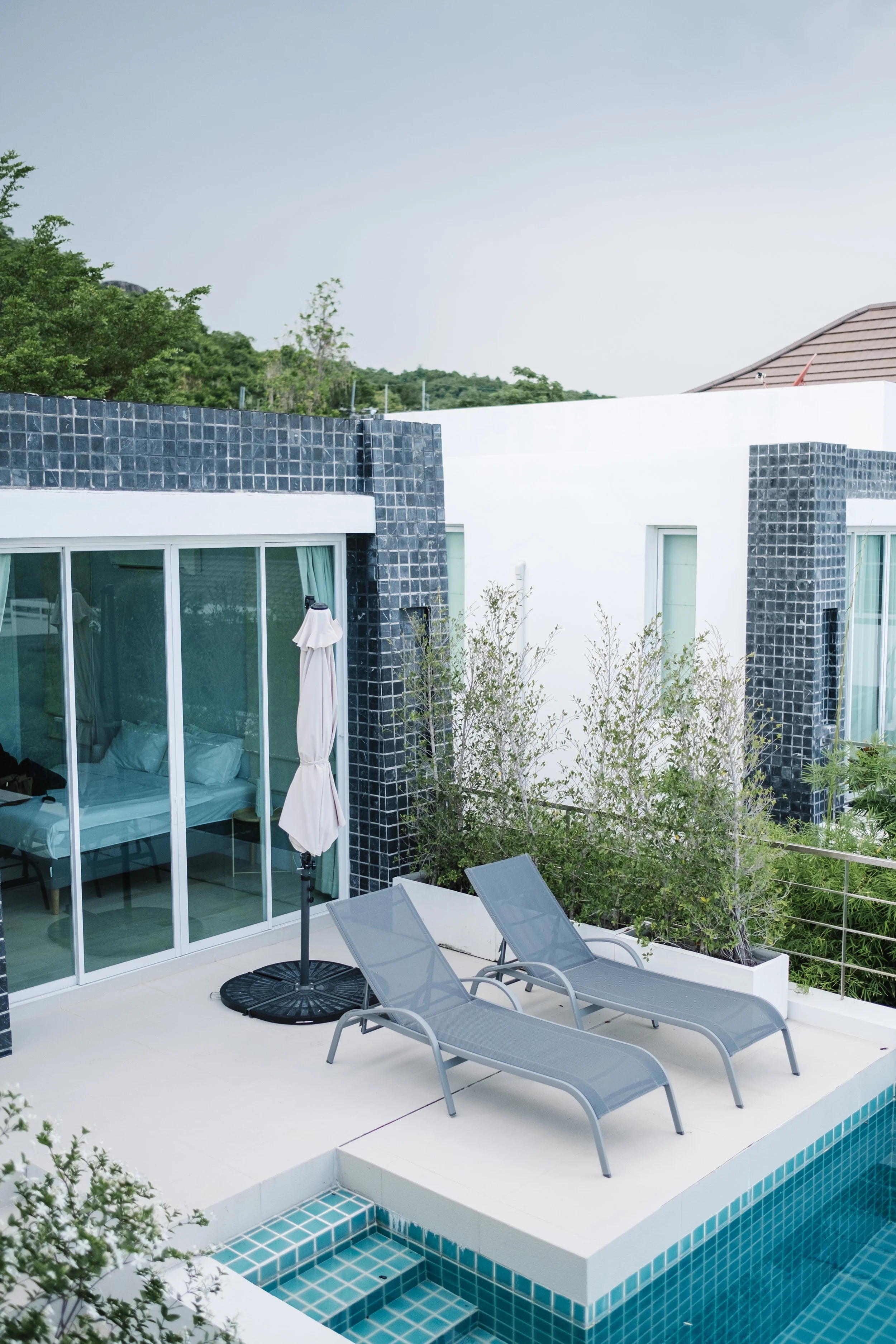 modern pool with minimalistic lounge chair