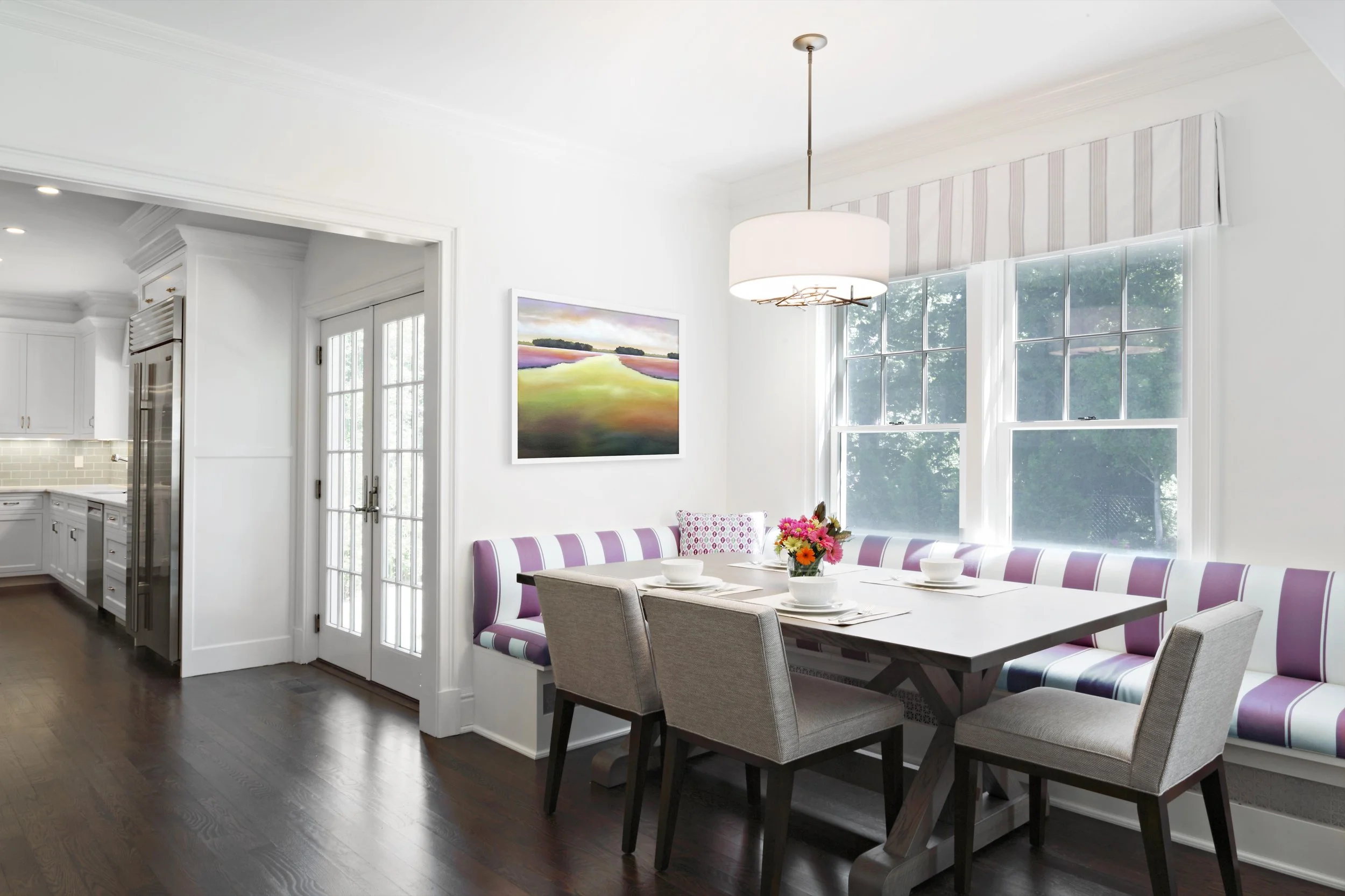 Elegant built-in breakfast banquette with custom upholstery by Luminosus Designs for Parkfield House, Scarsdale NY.