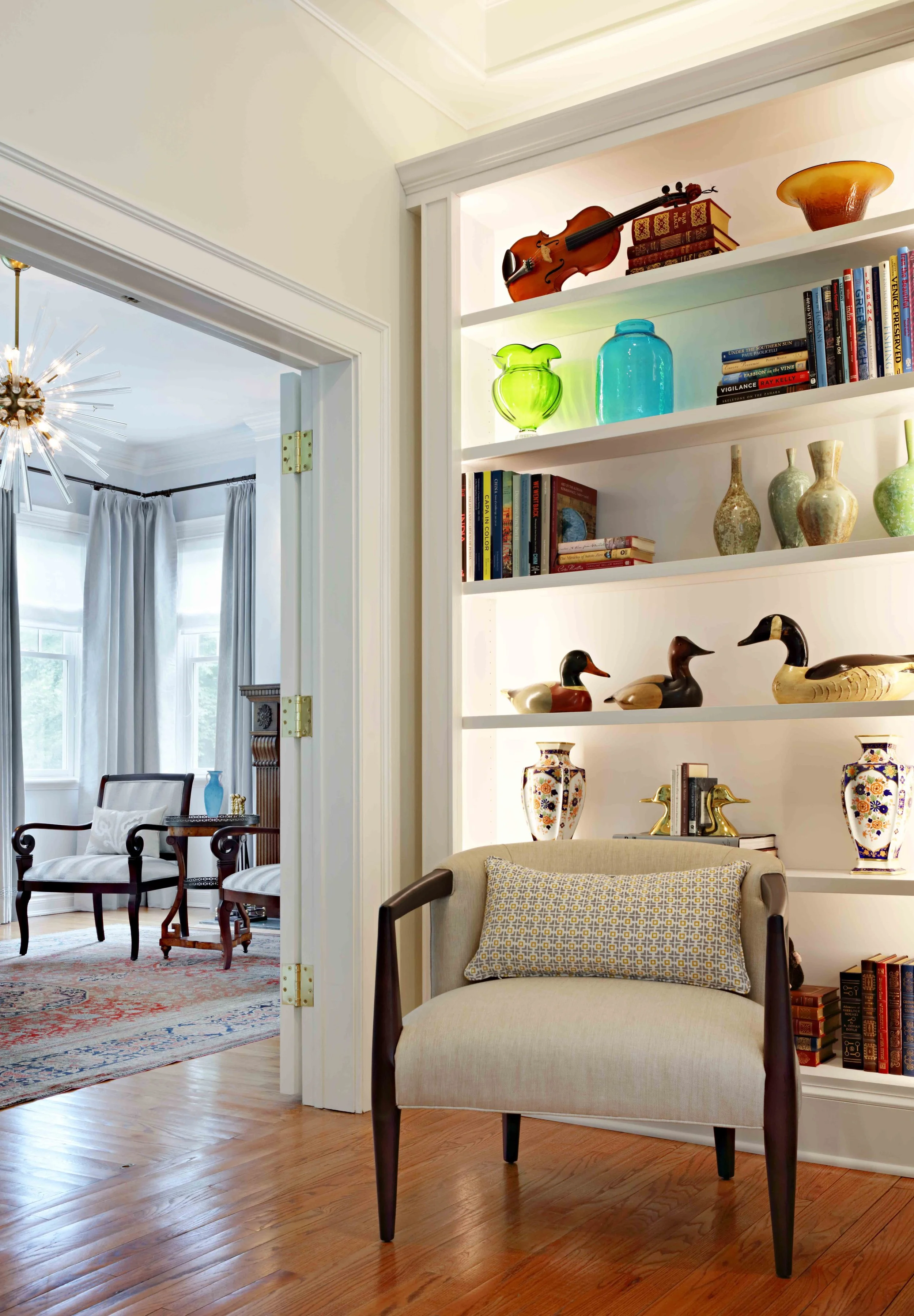 Family Room featuring coffee table vignette at Lismore House in Greenwich, CT.