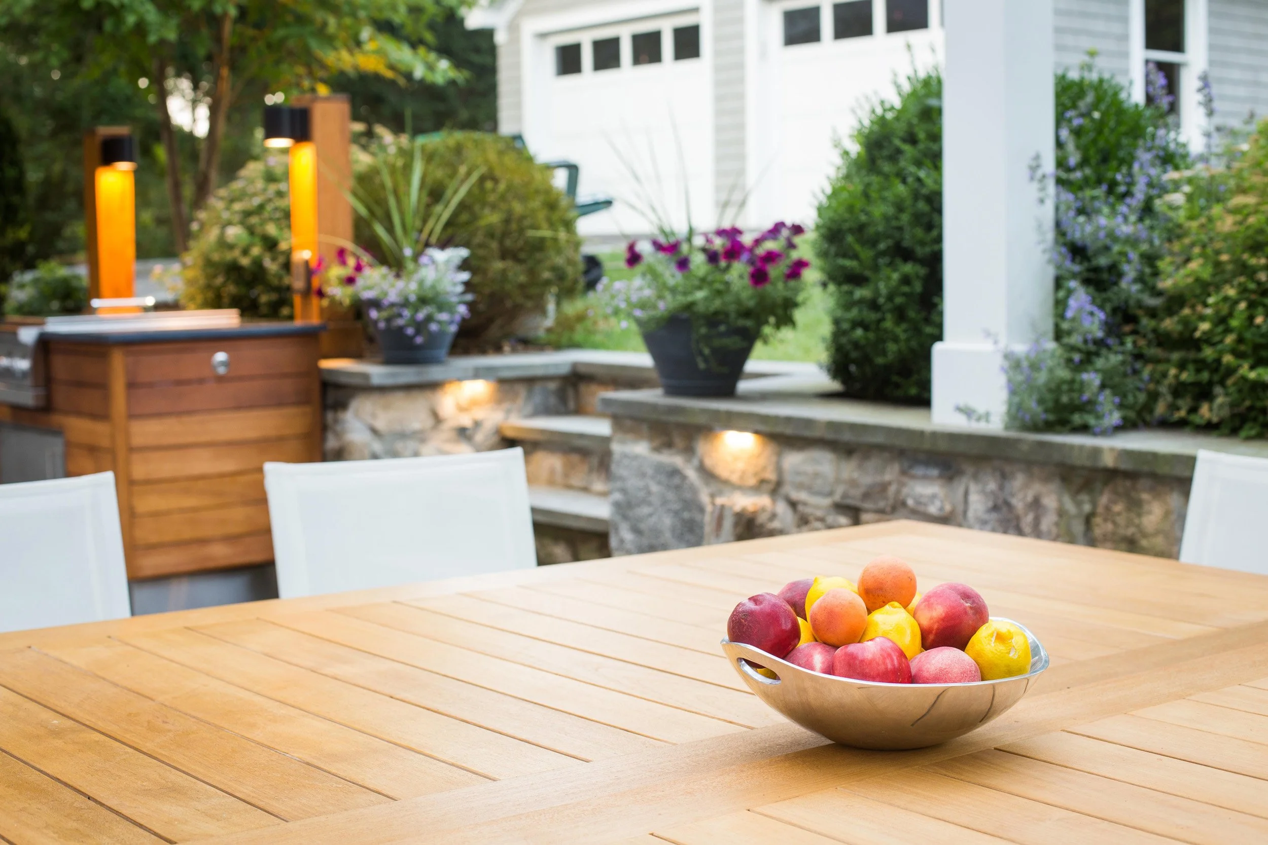 Close-up of dining tables in the outdoor seating at the Indian Field Outdoor project in Greenwich, CT.