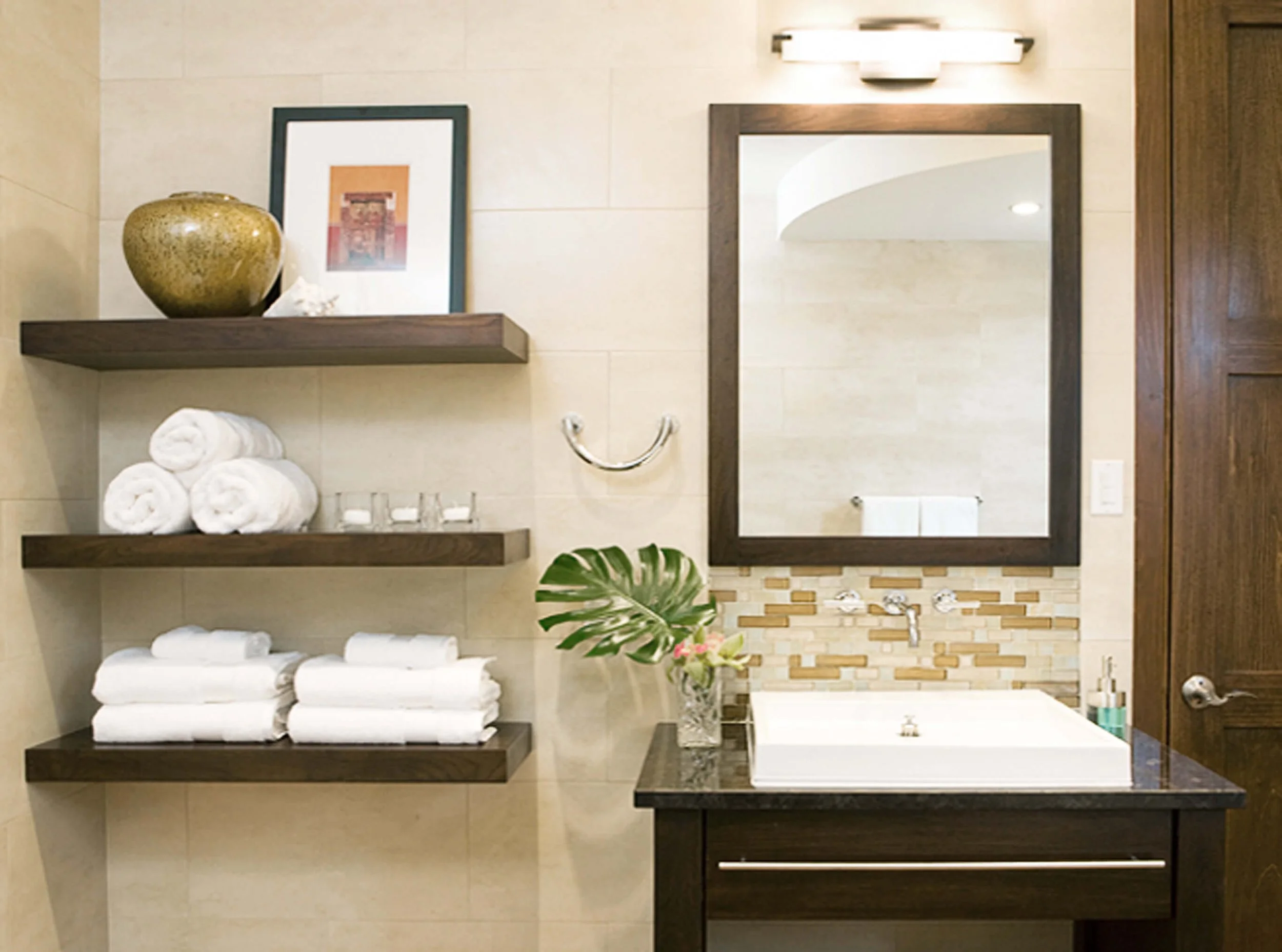 Bathroom vanity design in Grand Cayman guest villa with natural materials and clean layout.