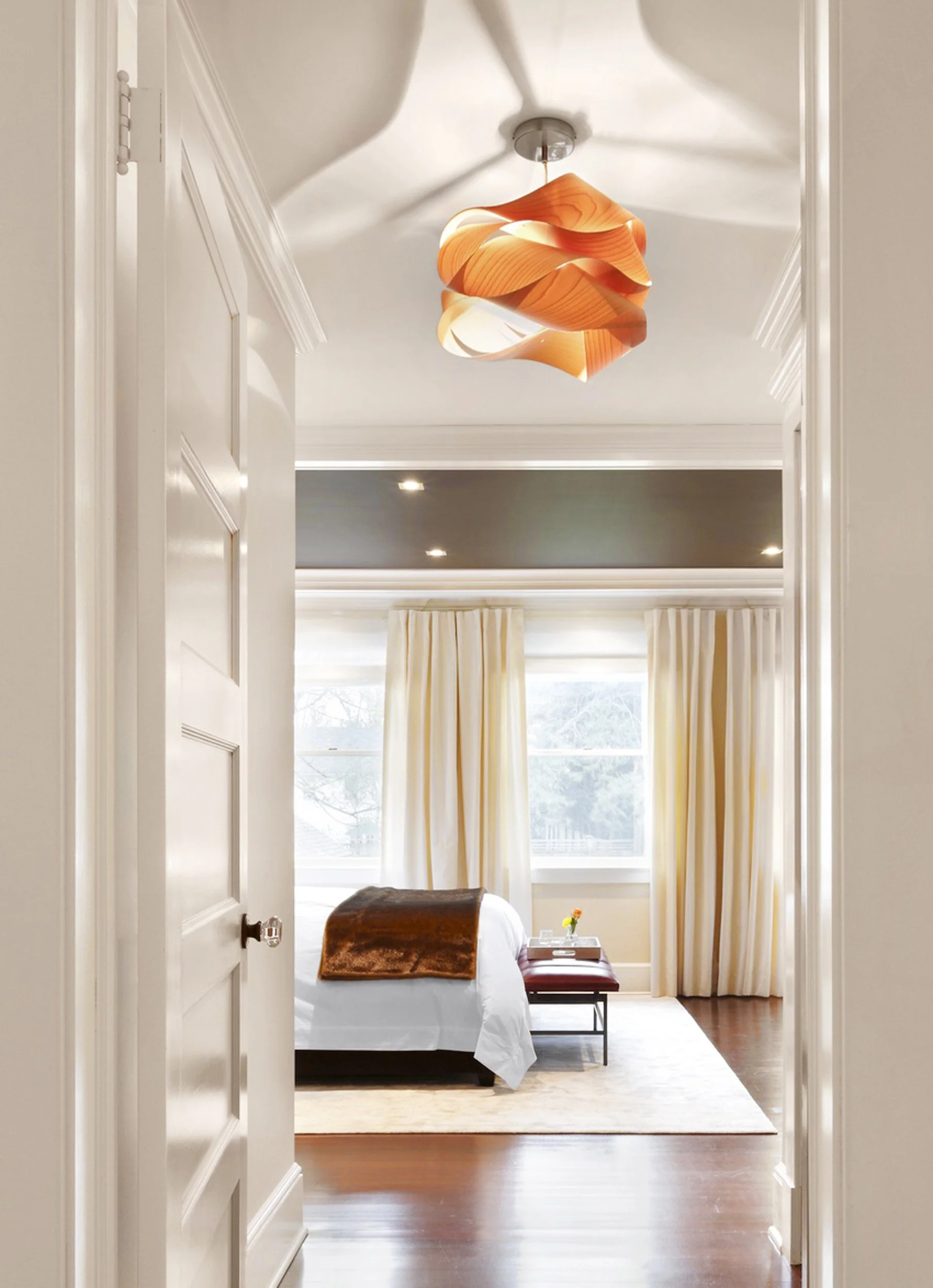 Ceiling pendant detail providing ambient lighting in primary bedroom entrance in Indian Field residence in Greenwich, CT.