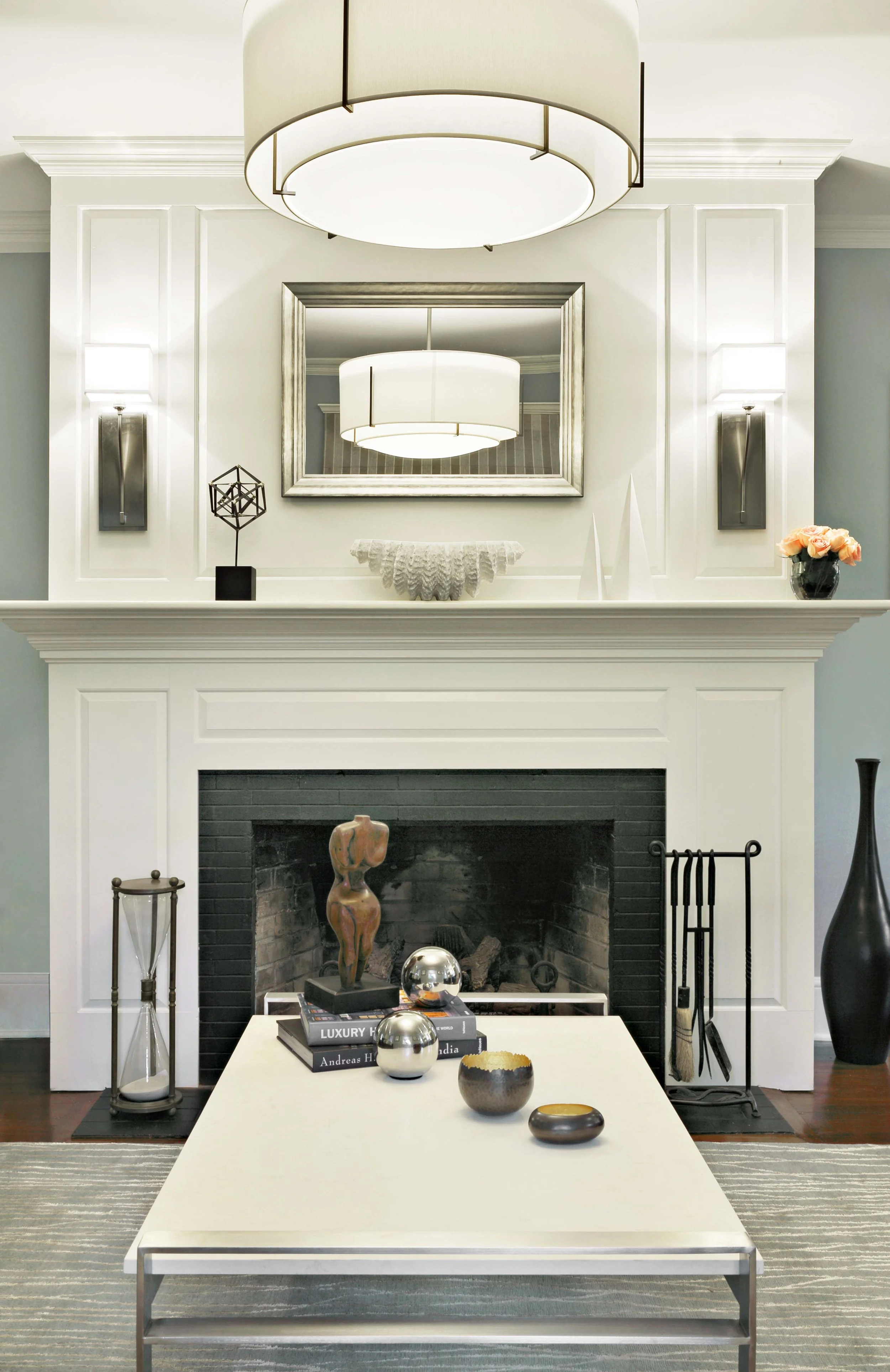 Close-up of fireplace surround and millwork detail.