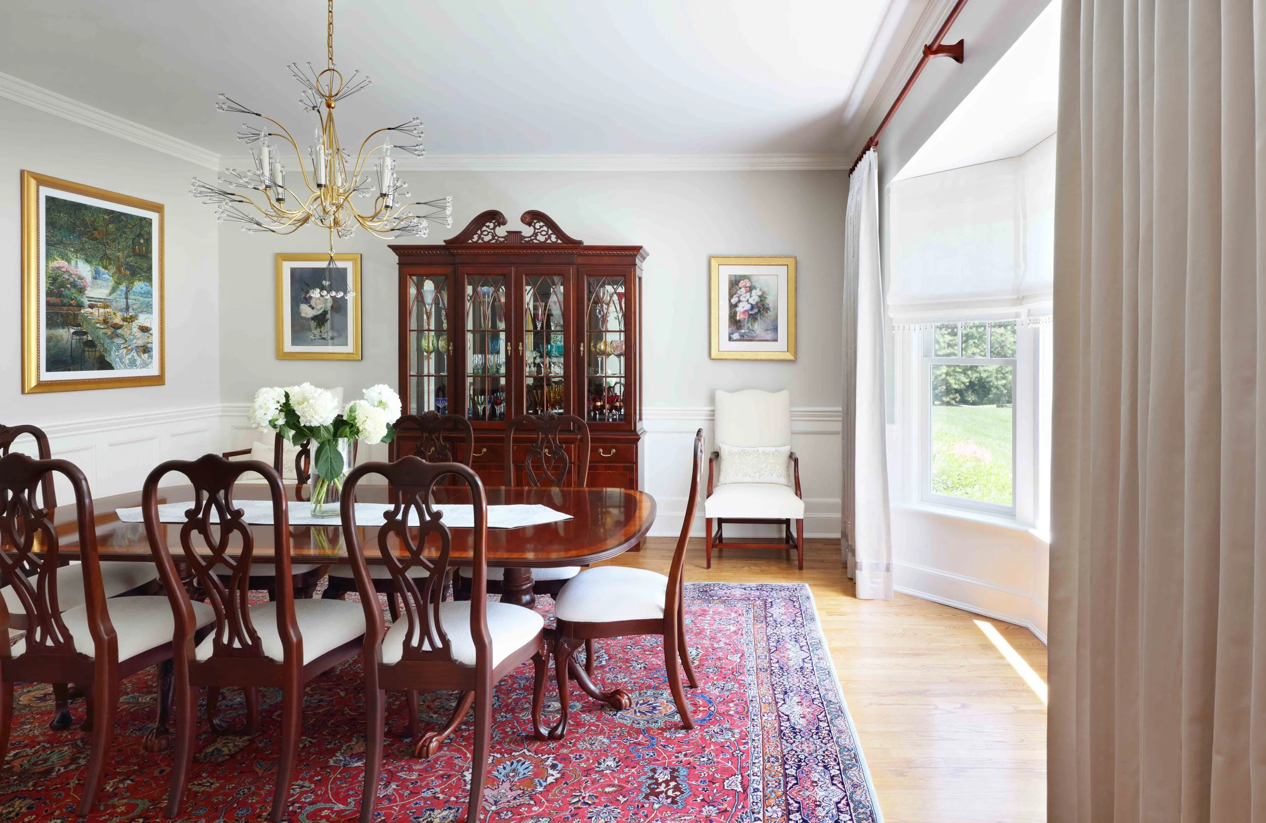 Dining Room featuring china cabinet, dining set at Lismore House in Greenwich, CT.