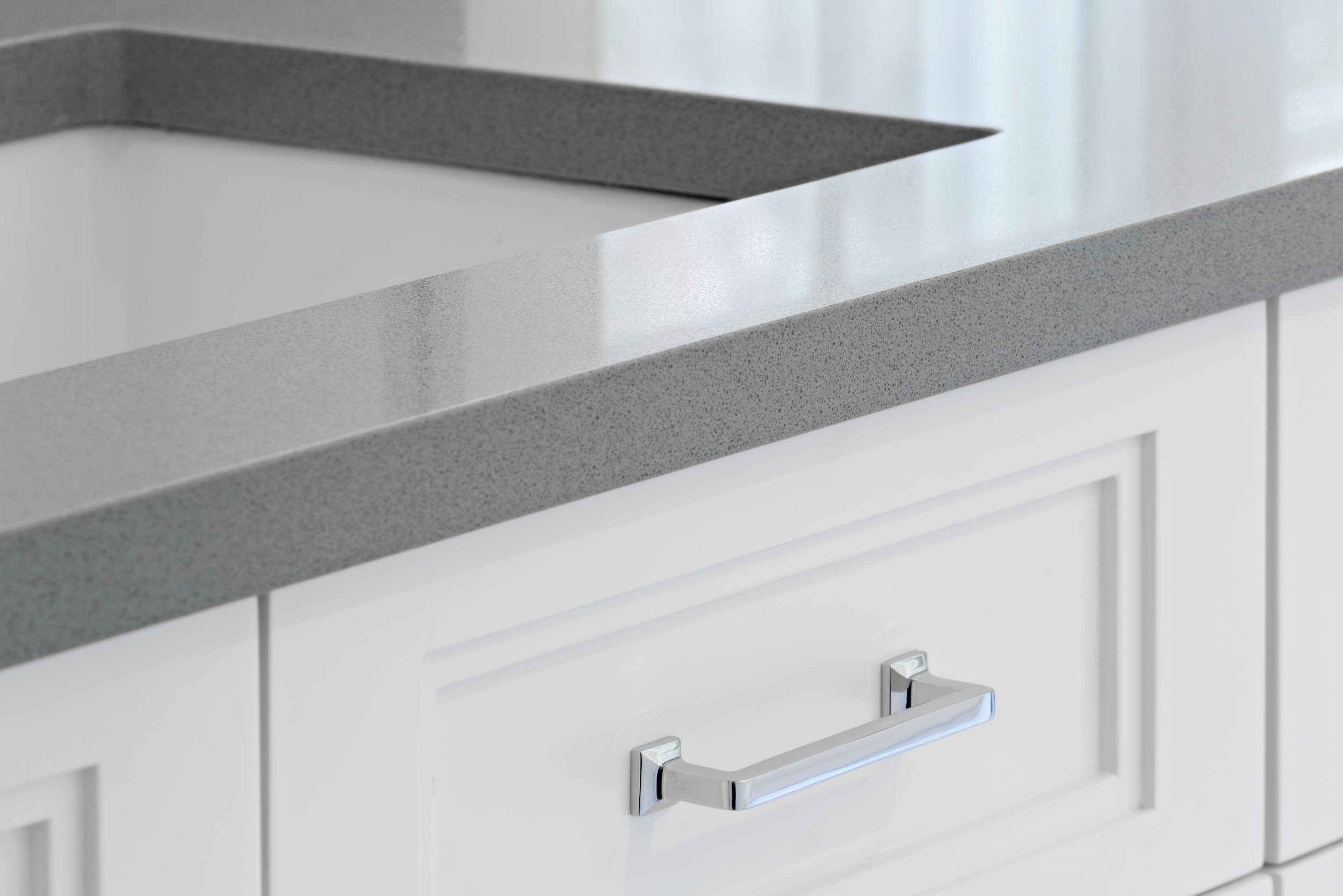 Detail of polished nickel vanity hardware and custom cabinetry in a Jack and Jack bathroom at the Dann Farm residence in Pound Ridge, NY.