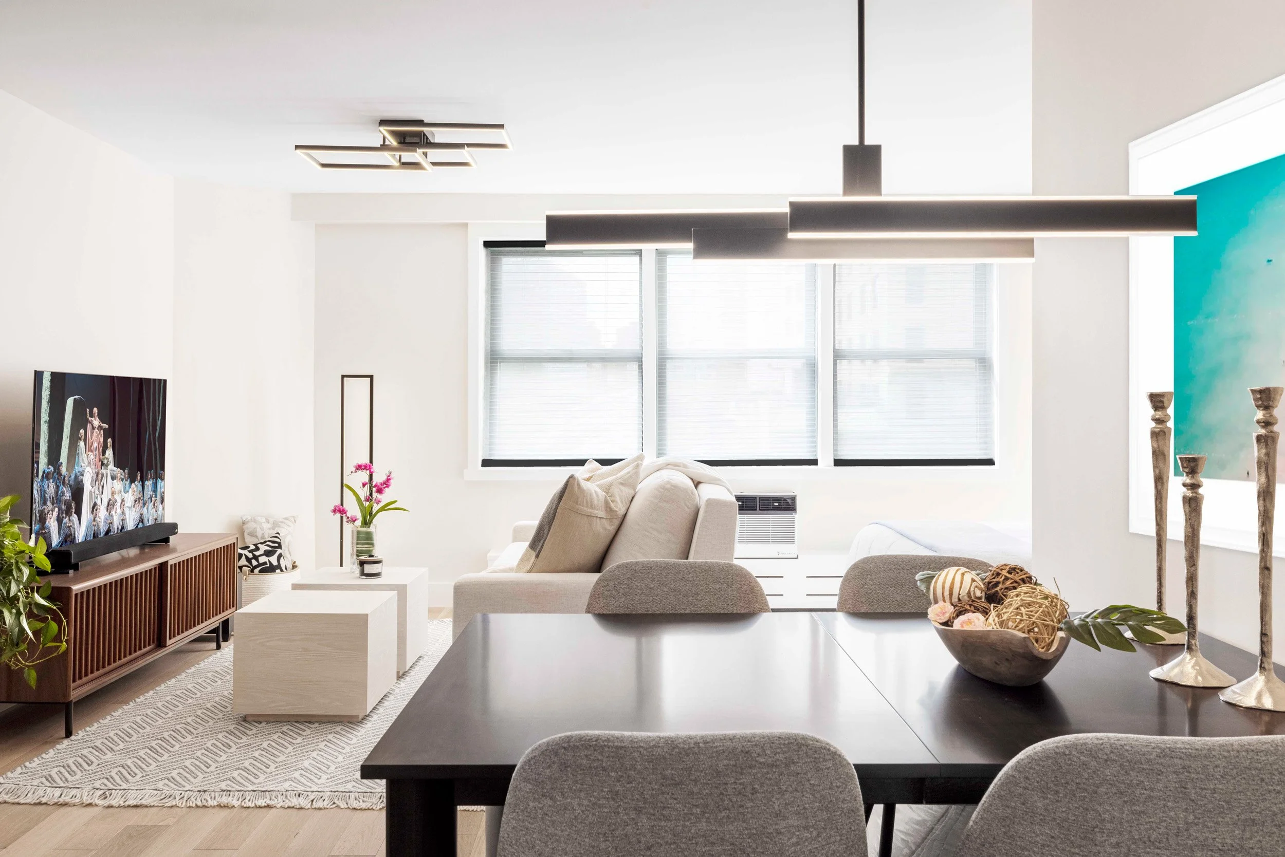 Detail view of dining table and pendant in the Gramercy Arms apartment, NYC.