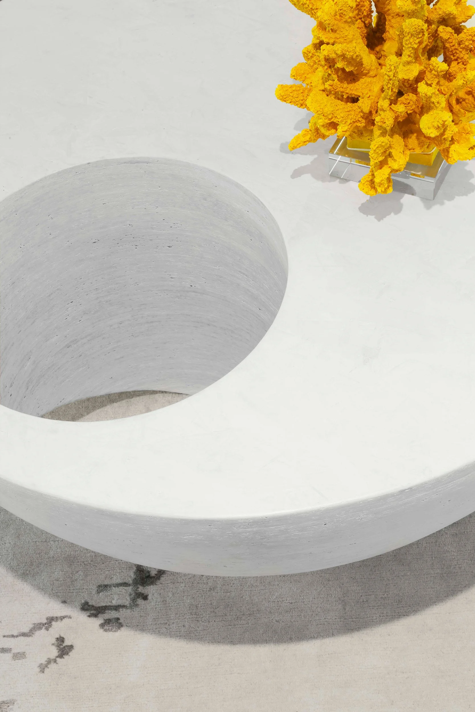 Detail of the sculptural coffee table and decor in the living room at the Meeting House in Greenwich, CT.