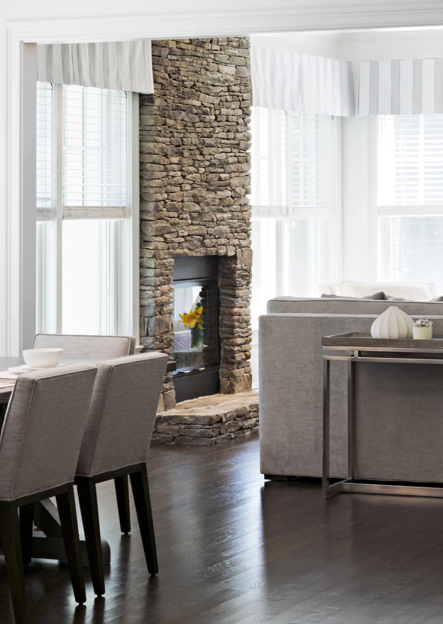 Stone fireplace close-up view in family room in Parkfield House in Scarsdale, NY.