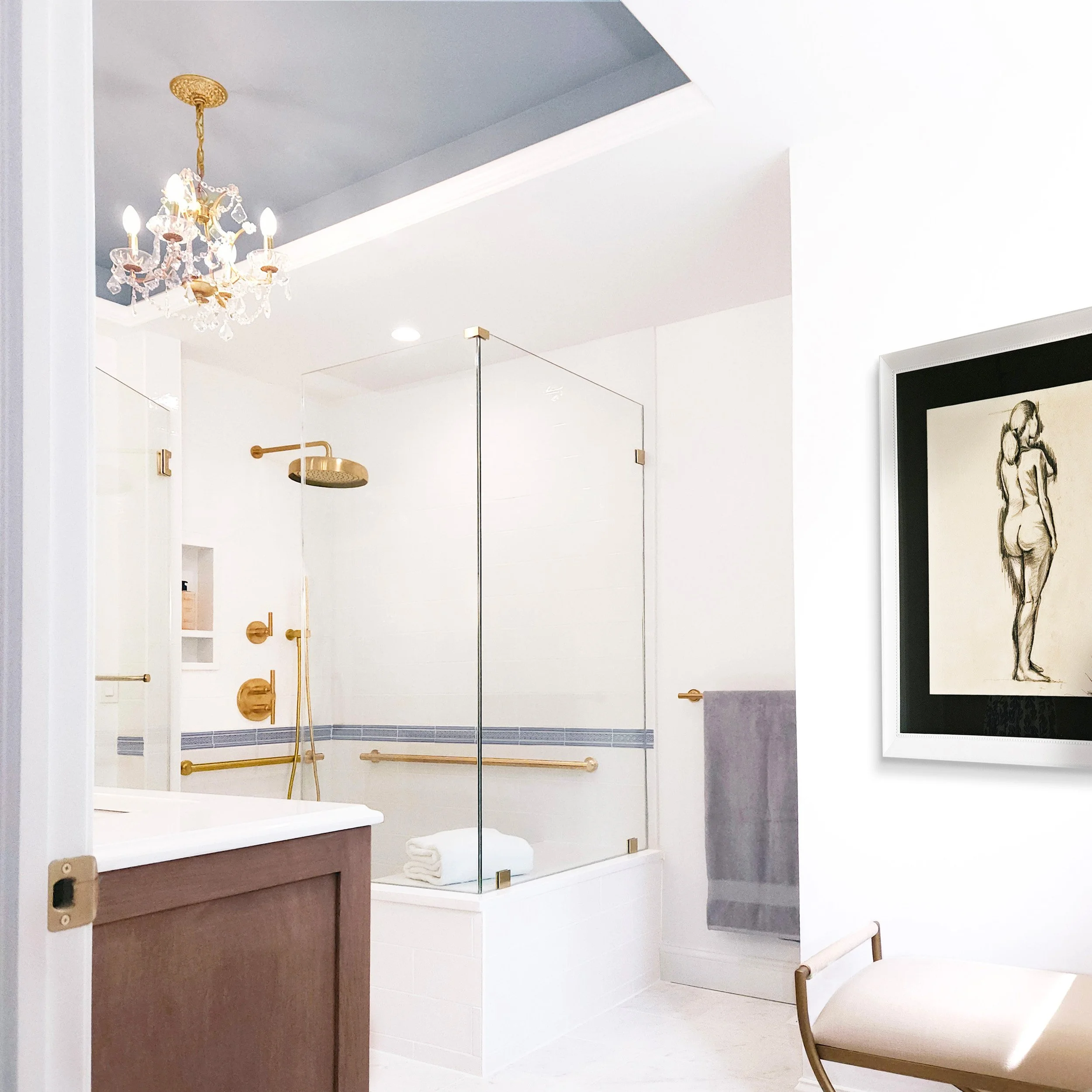 Close-up view of shower, vanity, and bench in Carlyle Court in Princeton, NJ primary bathroom.