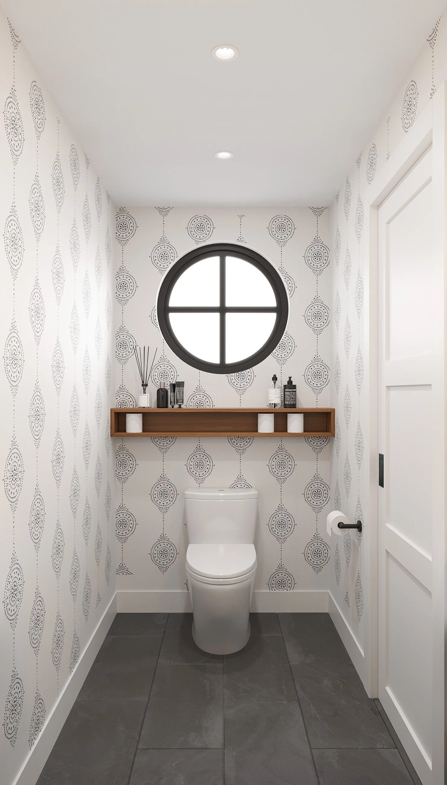 View of powder room toilet, wallpaper, and wall-mounted shelf in Nanny Hagen House in Thornwood, NY. 