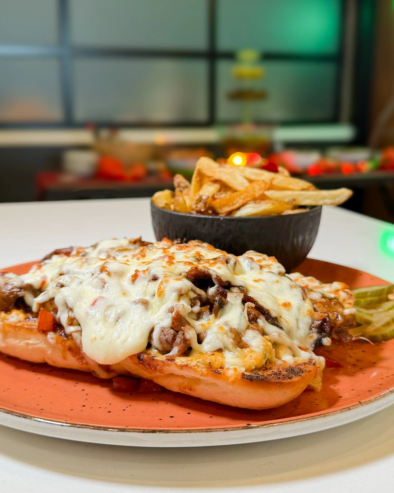 Philly Cheesesteak debates are serious business. Wiz or provolone? Peppers or no peppers? We settled it our way. 🫑🧀

Available on our lunch and dinner menu, this one is worth coming in for:

Slow-roasted beef &middot; Demi-glace &middot; Saut&eacut