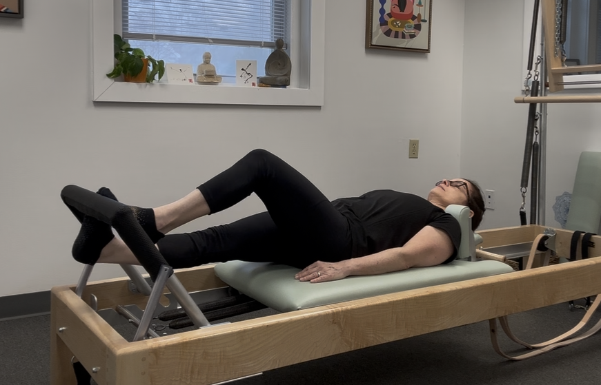 Classical Pilates footwork on the reformer at a Westport studio