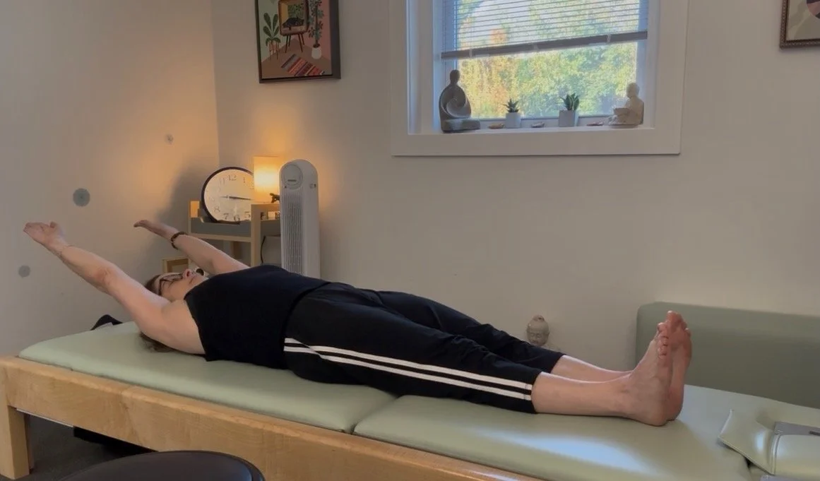 Guided Pilates movement focused on posture and control