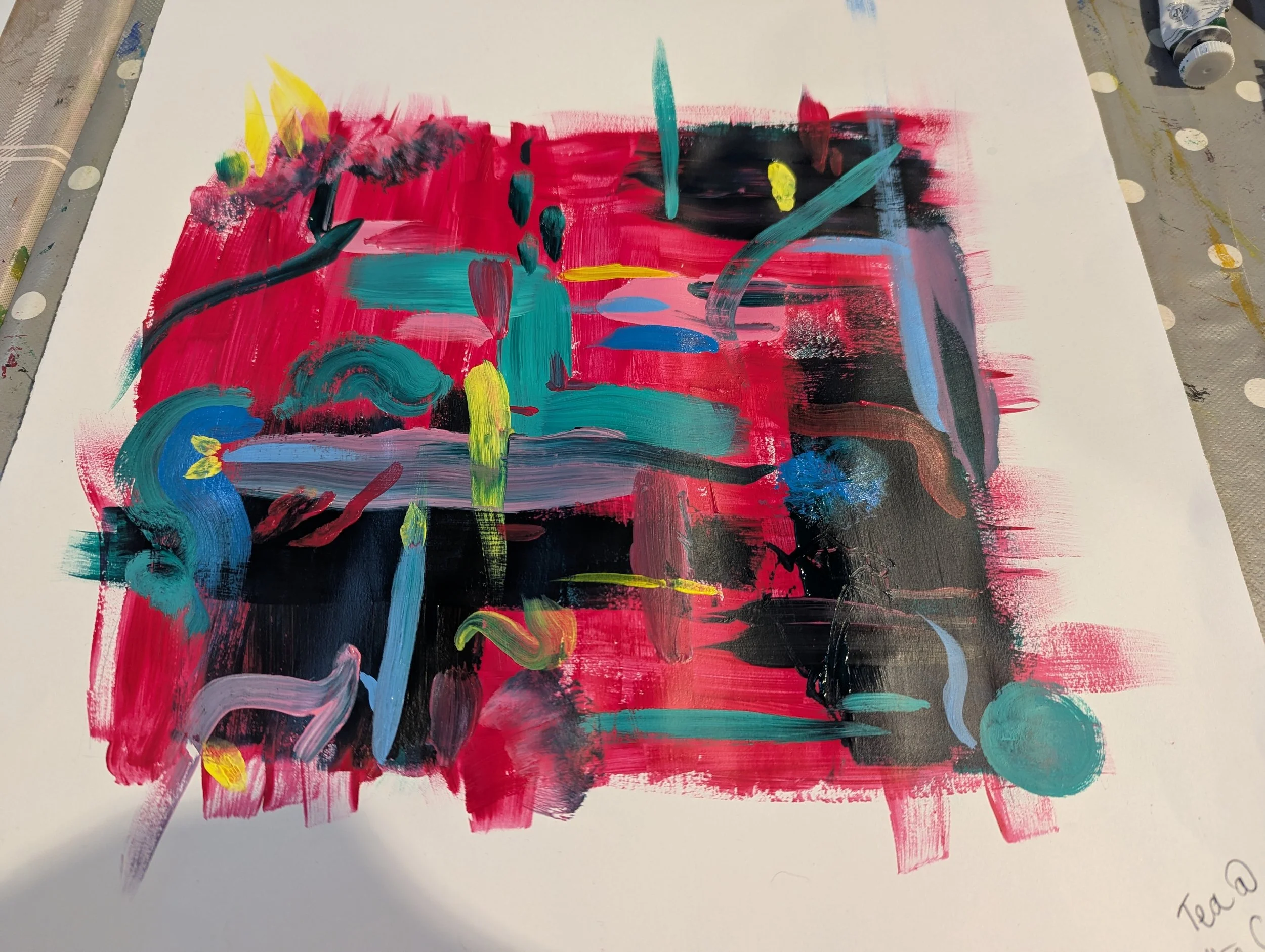 Student work. Abstract acrylic painting with bold brushstrokes in pink, black, teal, purple, and yellow, on a white sheet of paper.