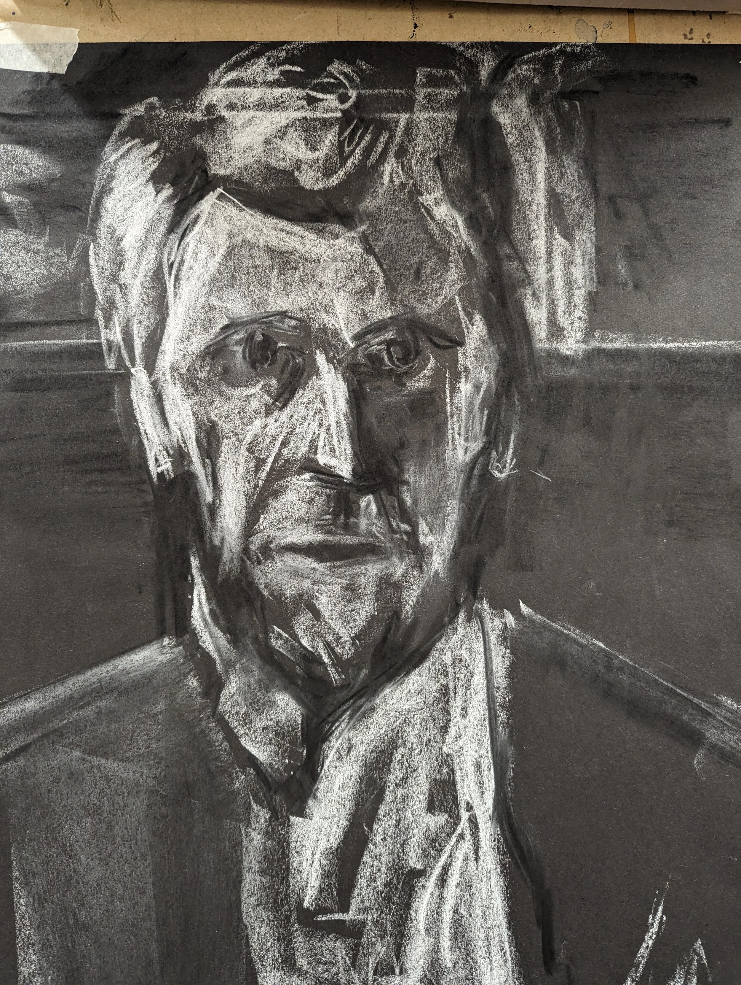 Black and white chalk drawing of a man with glasses (Victor Chocquet) with a roughly sketched background.