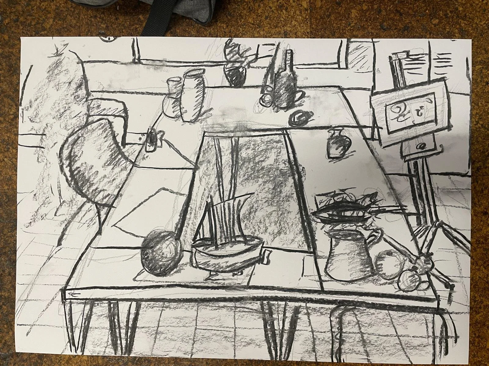 A black and white sketch of a cluttered tabletop with various objects including a wine bottle, glasses, vases, a small box, a computer monitor, and some fruits. The background features a window.