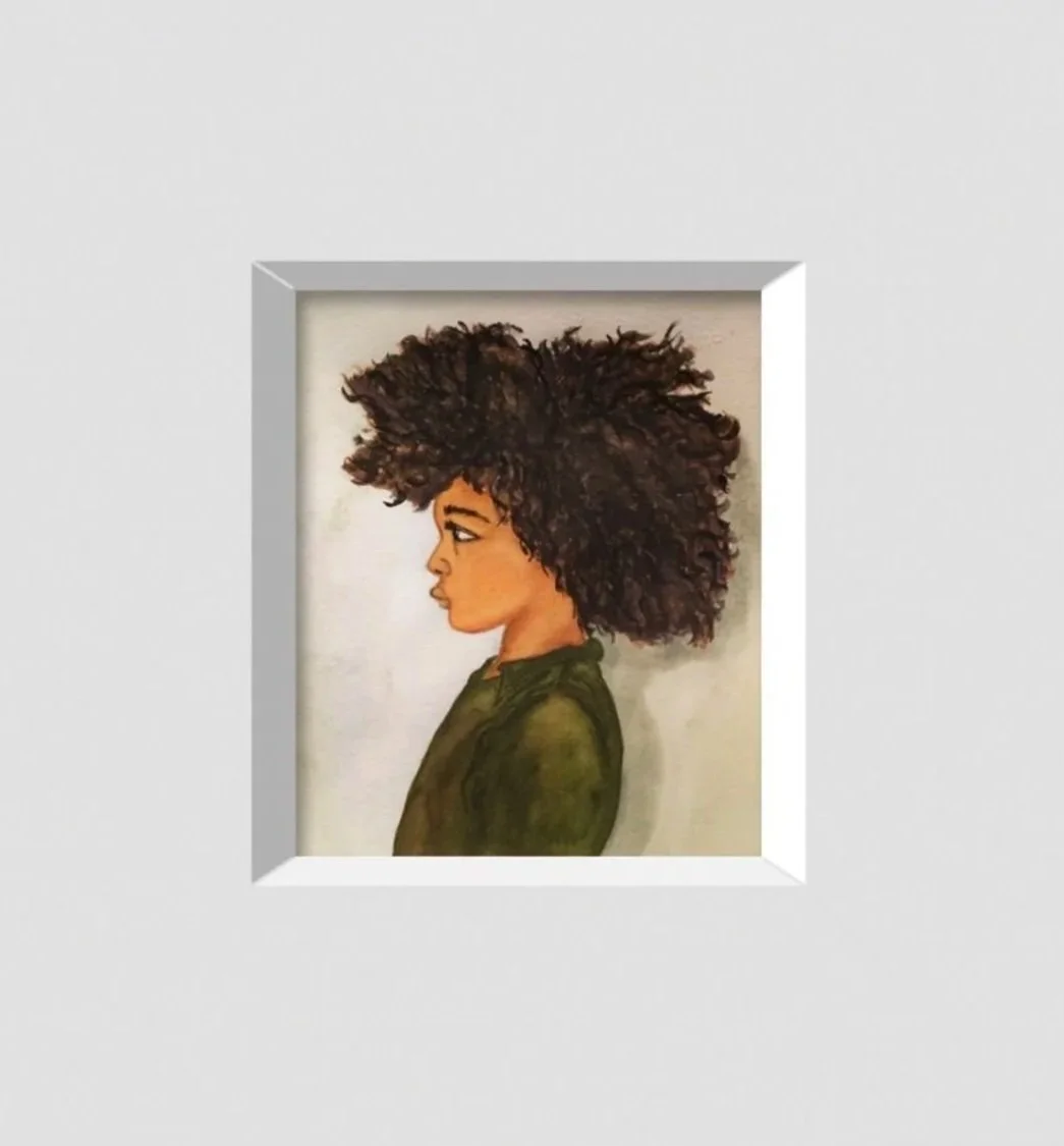 Side profile of a woman with curly hair and wearing a green top, set against a light background.