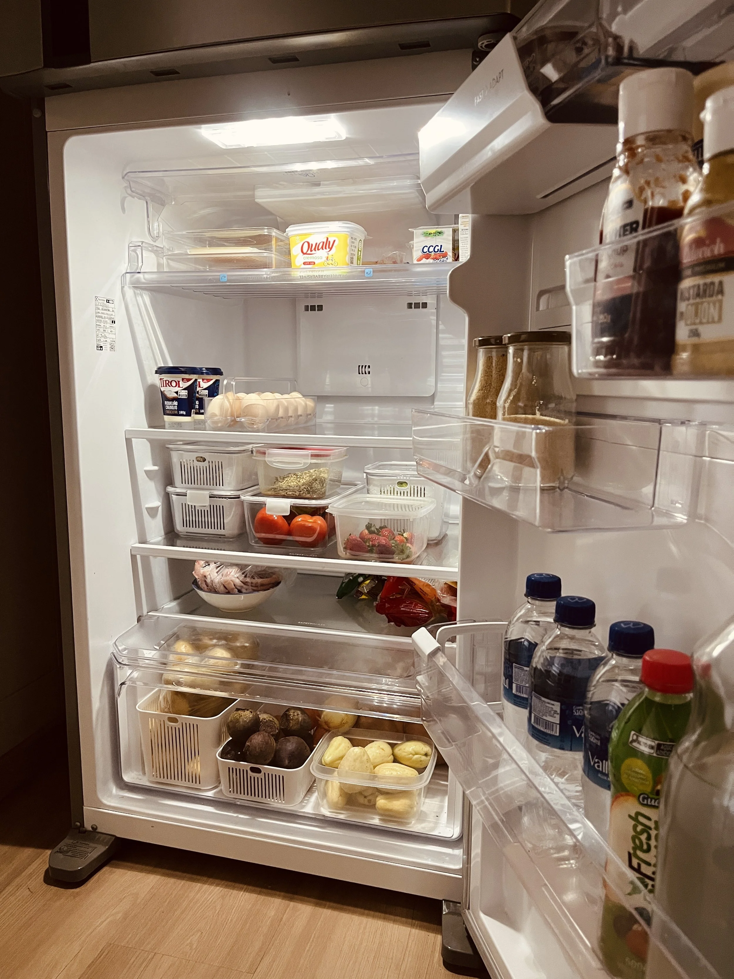 An organized and stocked fridge.