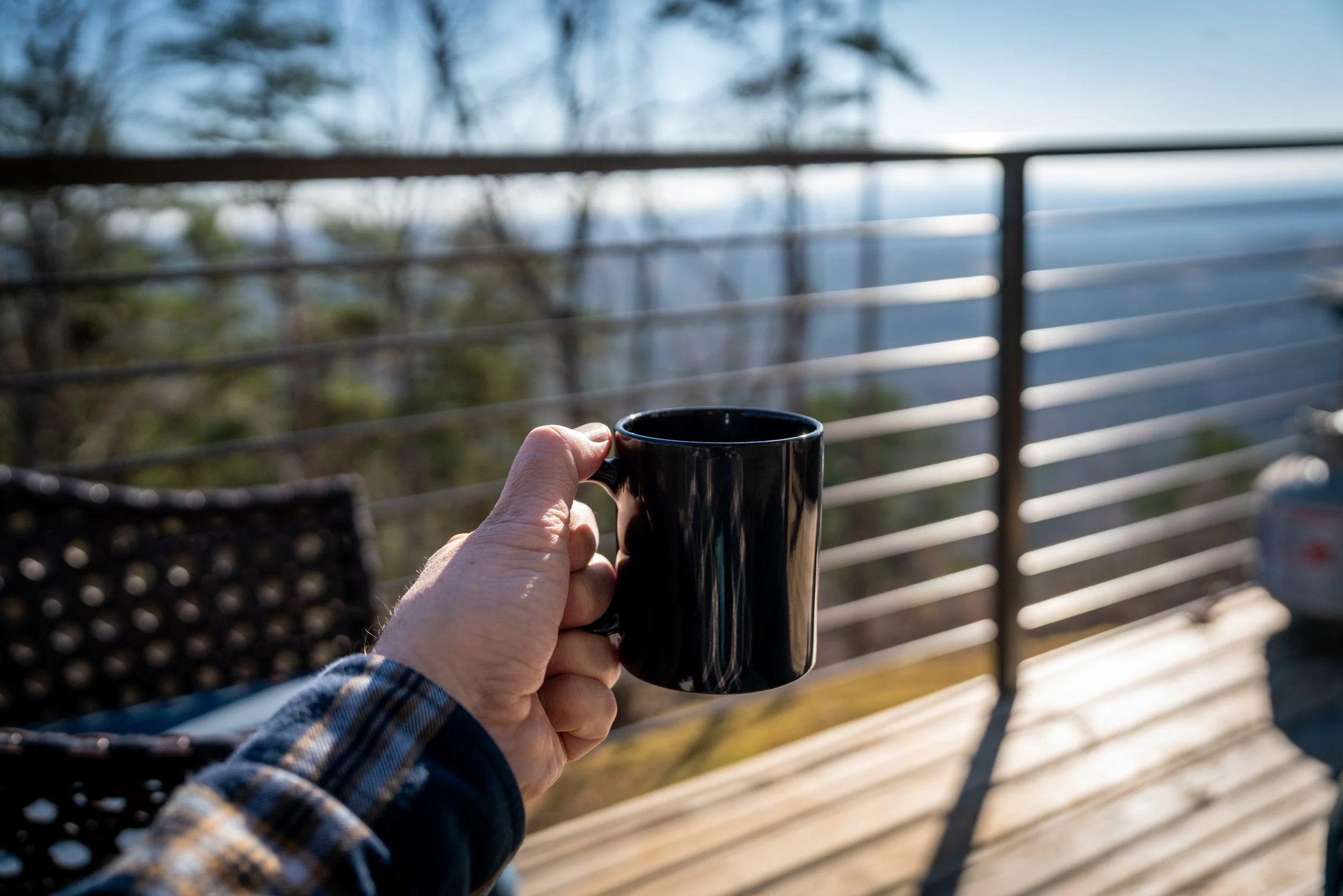 Relaxing with a cup of coffee or tea while looking over the mountains of North Georgia while on a personal retreat.
