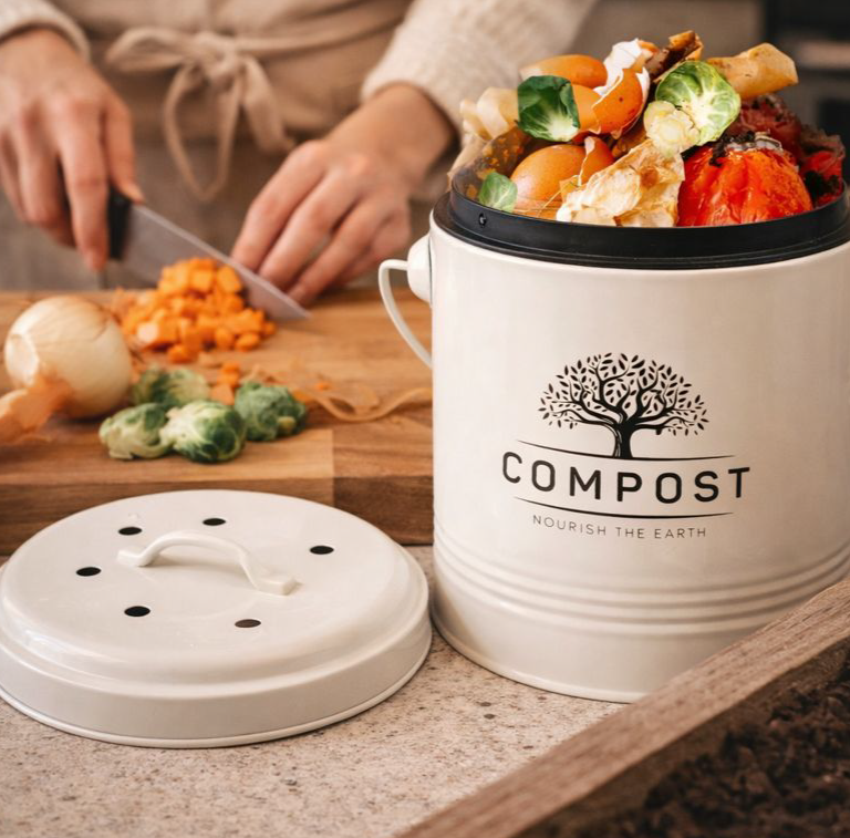 A simple countertop compost bucket makes it easy to save kitchen scraps during everyday meal prep. By collecting vegetable peels and eggshells as you cook, composting becomes a natural habit that supports healthier garden soil later on. 