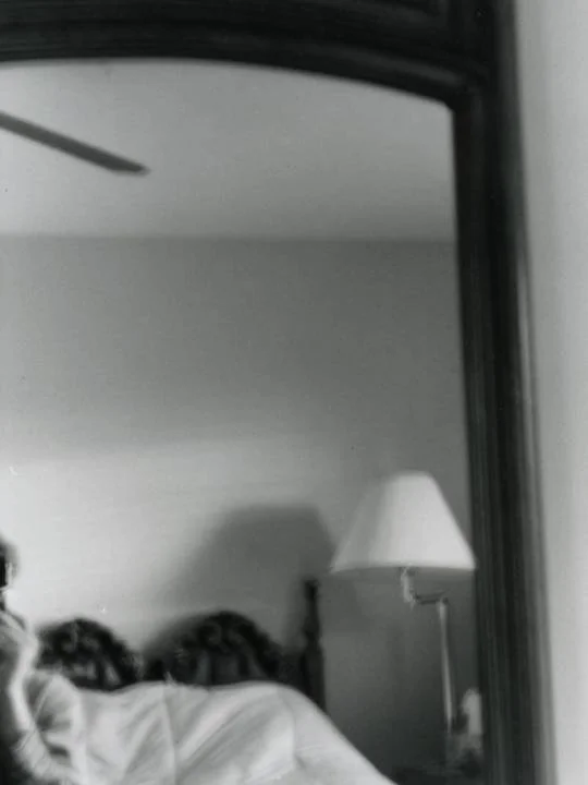 mirror and bed