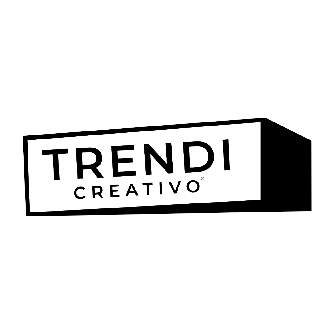 Black background with a white tilted rectangular sign displaying the text "TRENDI CREATIVO" in black uppercase letters.