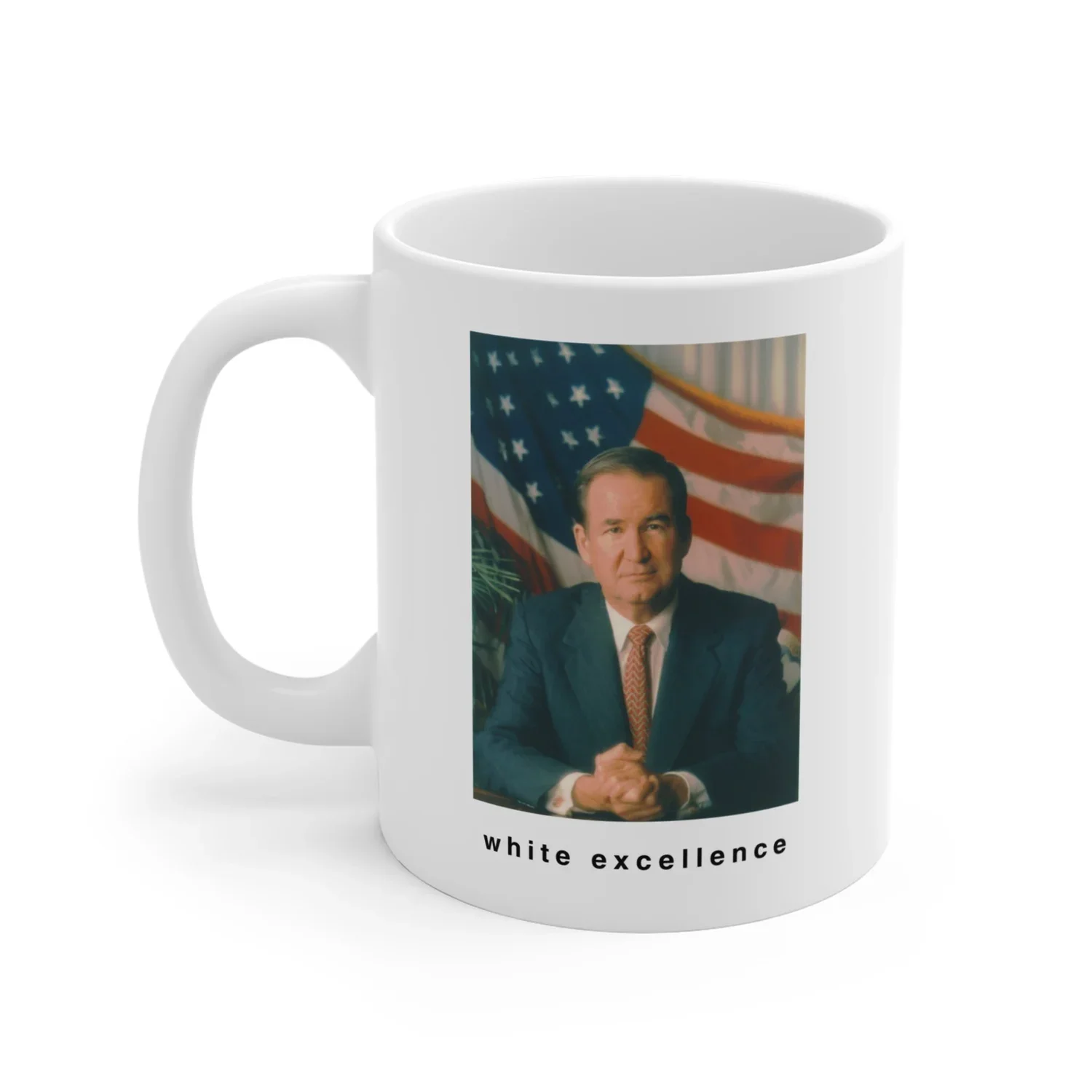 White mug with an image of a man in a suit sitting at a desk with American flags in the background, and the words 'white excellence' written below