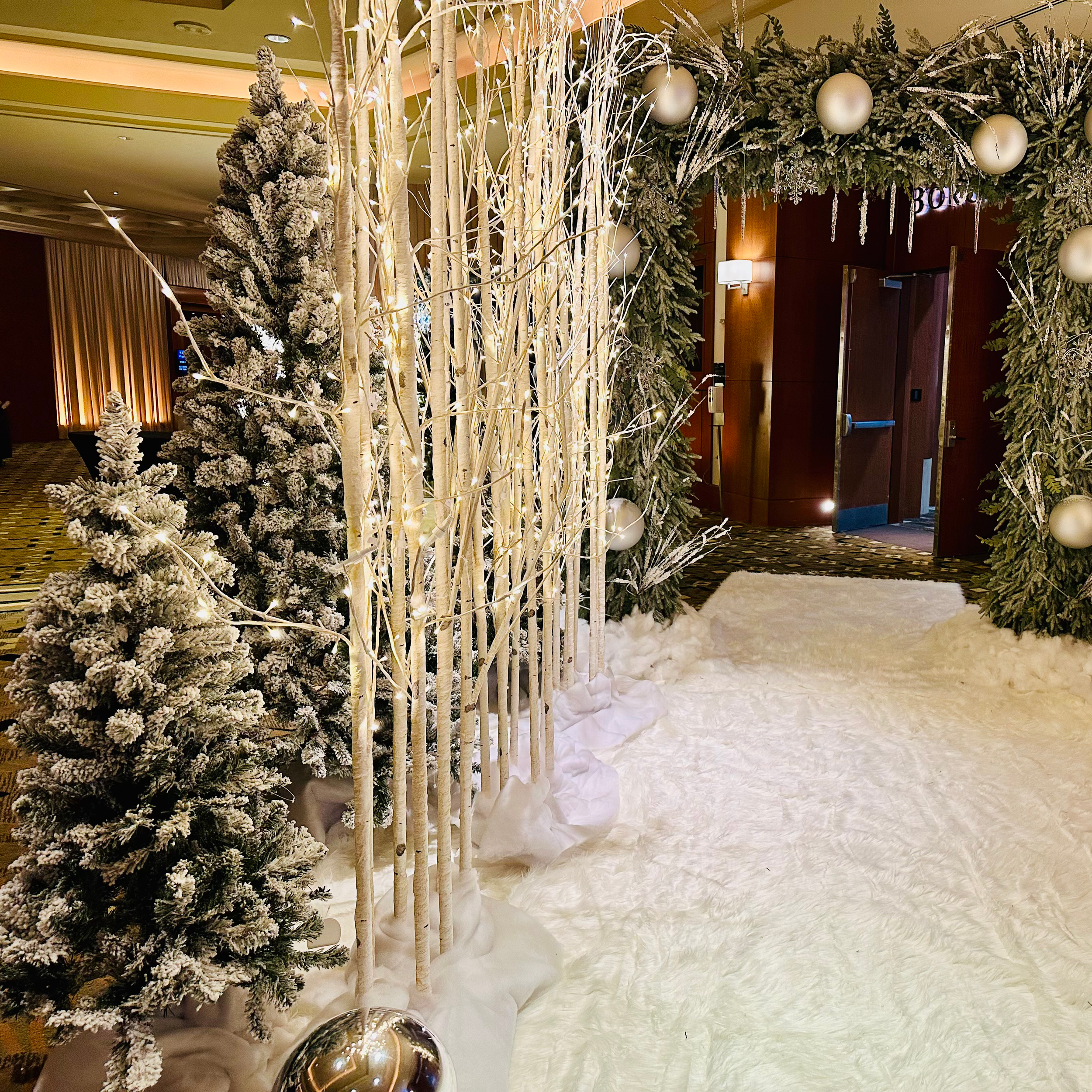 Pre-Lit Large Birch Artificial Tree entrance way.png