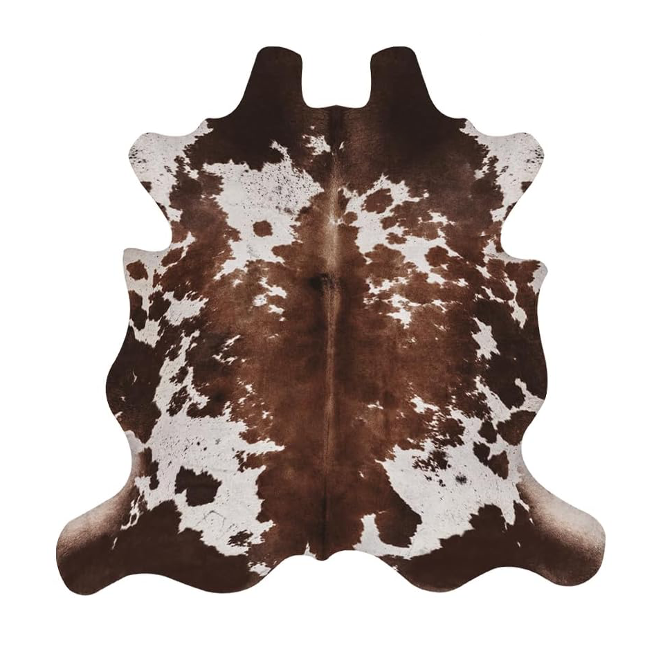 Faux Cowhide Cow Print Rug.png