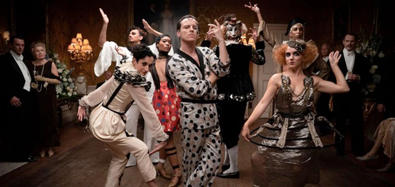 People dressed in theatrical costumes in King Bee independent film.