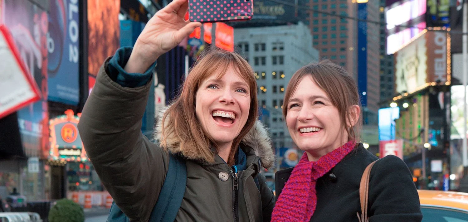 Emily Mortimer and Dolly Wells taking a selfie in New York City in HBO comedy series Doll & Em.