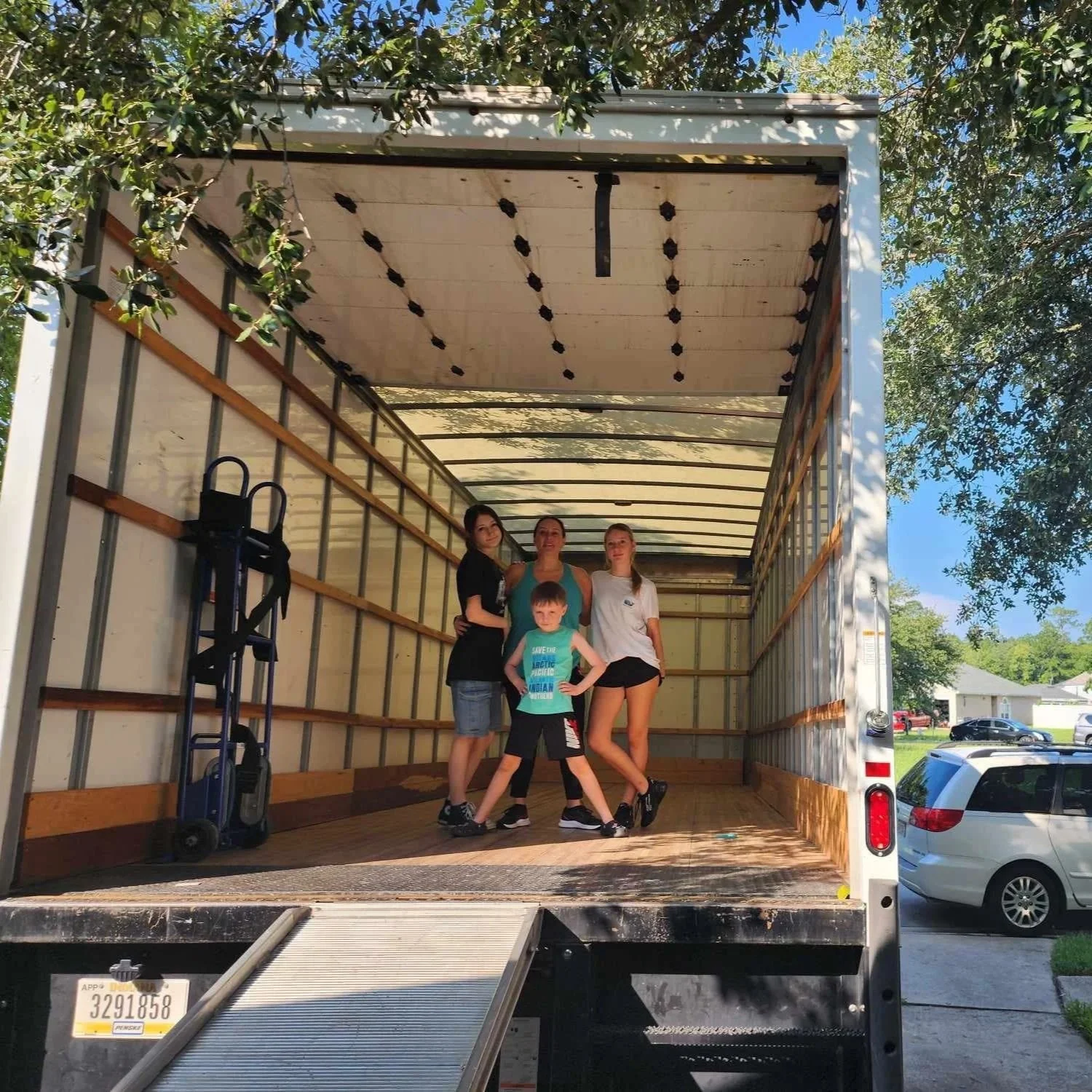 Happy home buyers with Living Truth Homes Realty