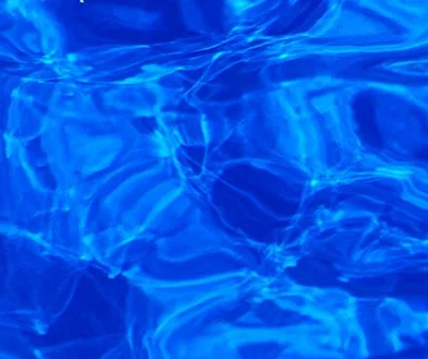 Close-up of blue water with ripples and reflections