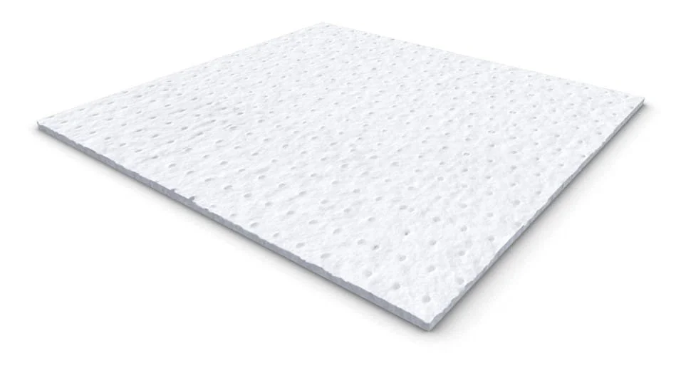 A white textured foam panel with small holes, viewed from an angle.