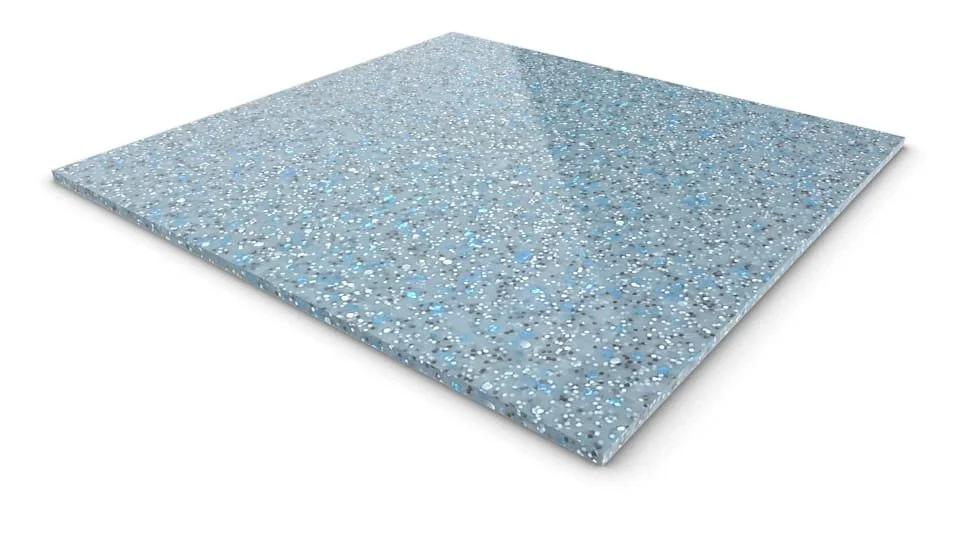 A square piece of speckled blue, gray, and white terrazzo flooring.
