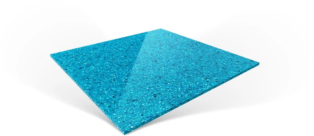 A blue terrazzo tile with a speckled pattern on a white background.