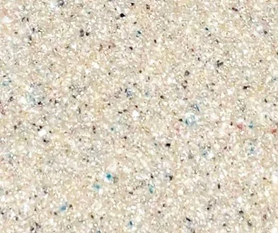 Beach Sand pool finish offering a light, natural look that appears clear in daylight and transforms under pool lighting at night.