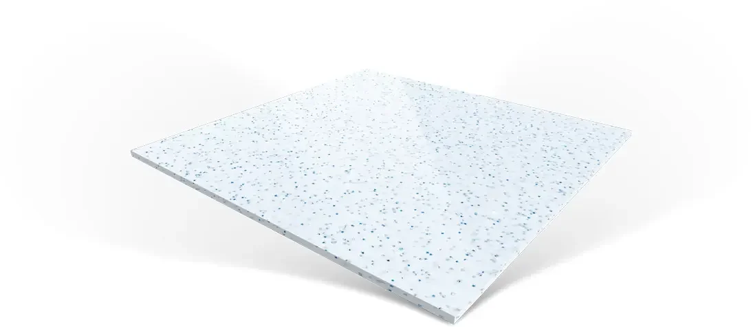 Close-up of a white terrazzo tile with blue and gray specks.