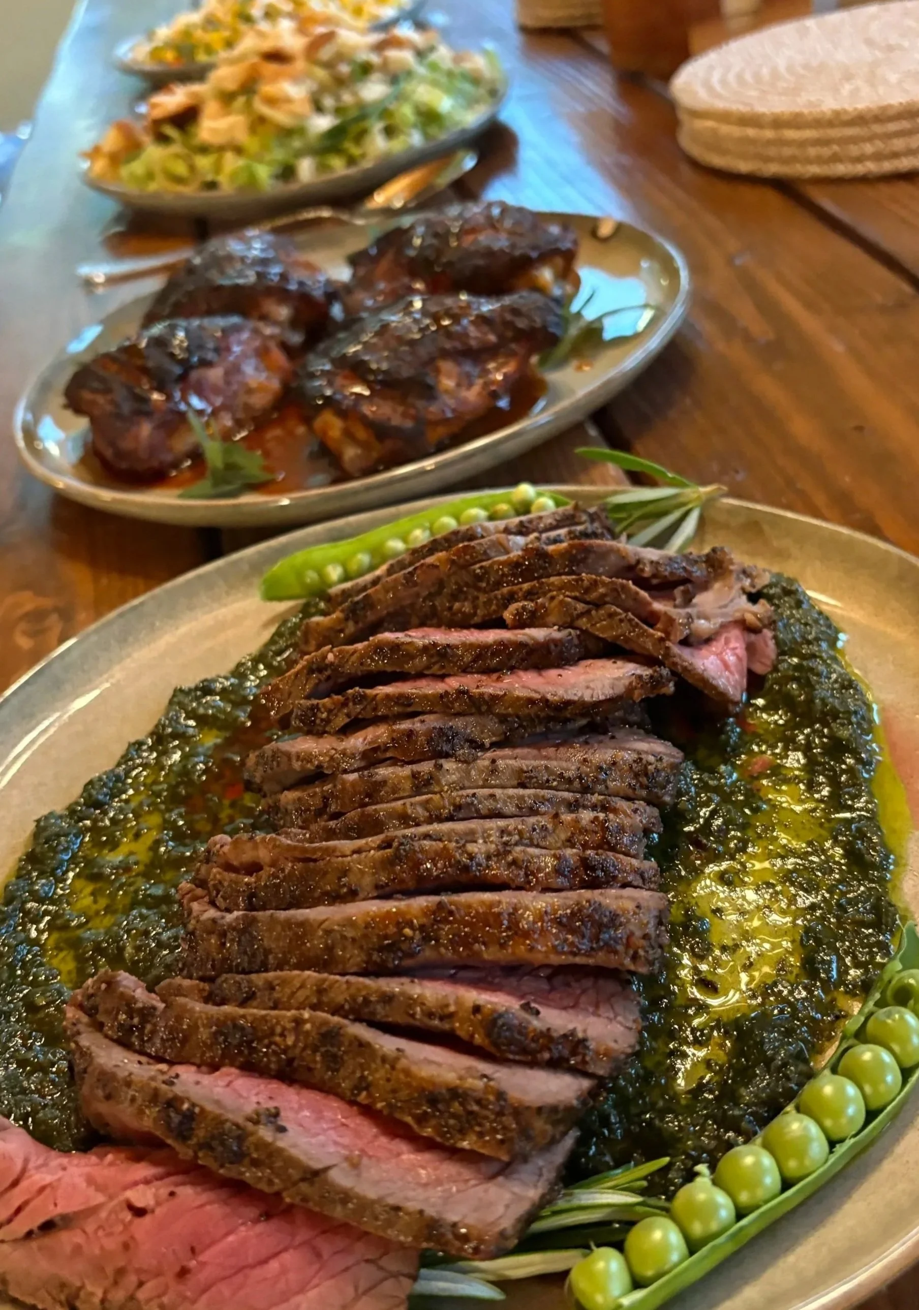 Private Chef serving family-style steak dinner at a vacation rental in Bandon Oregon
