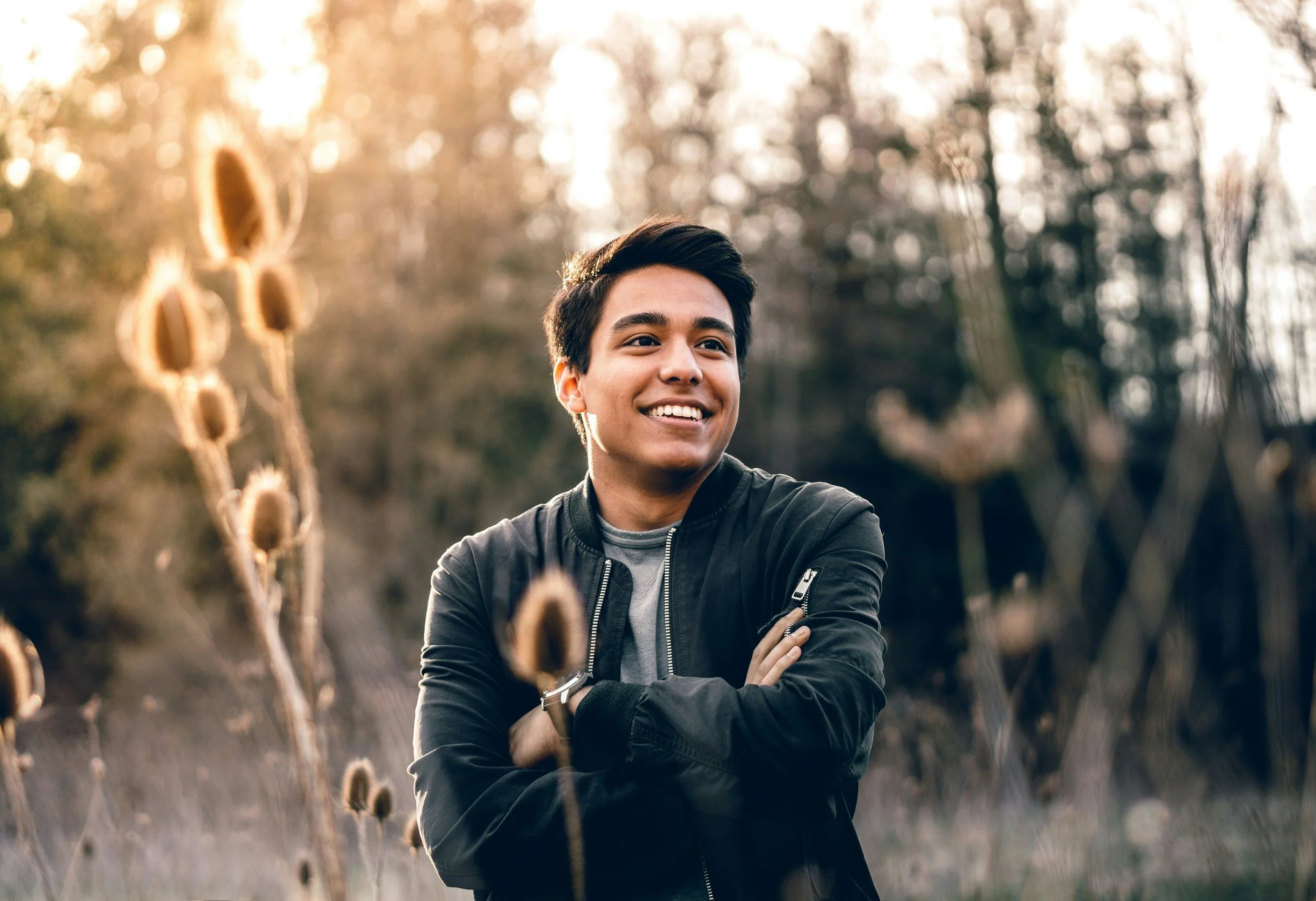 Patient smiling after wisdom teeth removal by oral surgeon in Arkansas