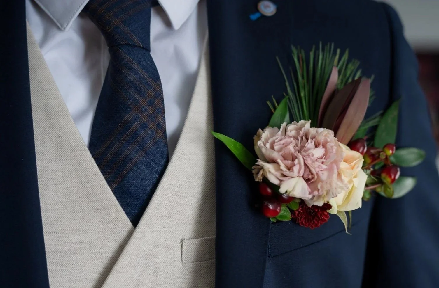 pocket boutenniere vintage pink carnation winter berries scabiosa