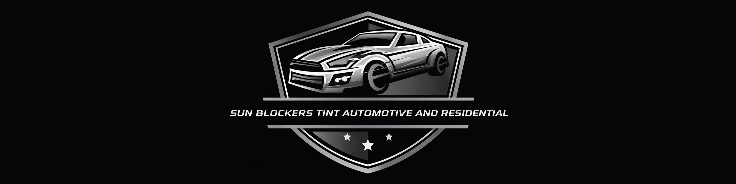 Logo of Sun Blockers Tint Automotive and Residential, featuring a stylized gray car and the company name with stars underneath.
